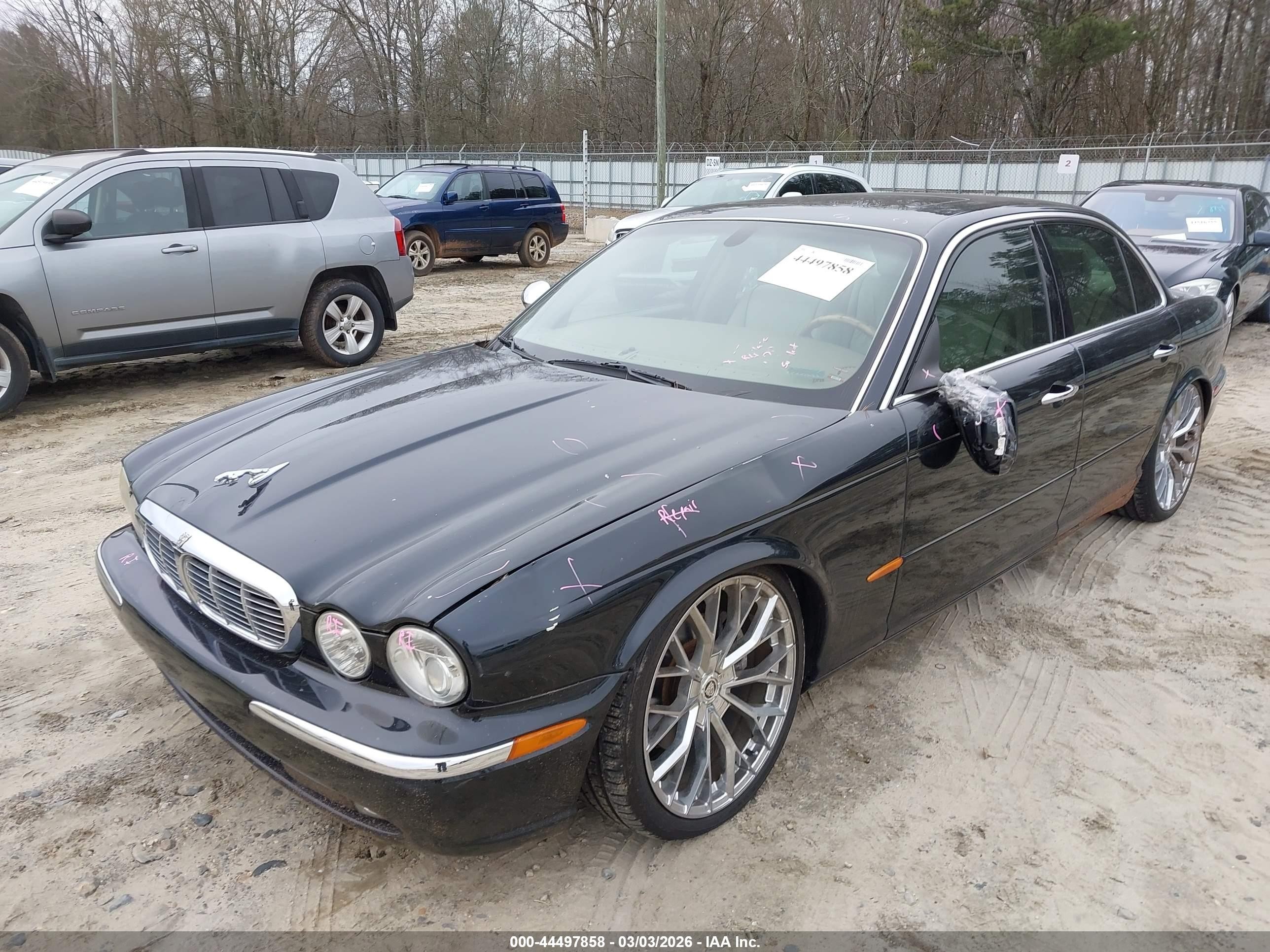 2004 Jaguar Xj Vanden Plas Black vin: SAJEA74C94SG05178