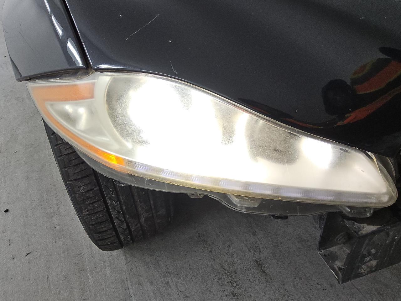 2012 Jaguar Xjl Black vin: SAJWA2GB9CLV28263 Damage: Right Head Lamp, Faded, Repair Required