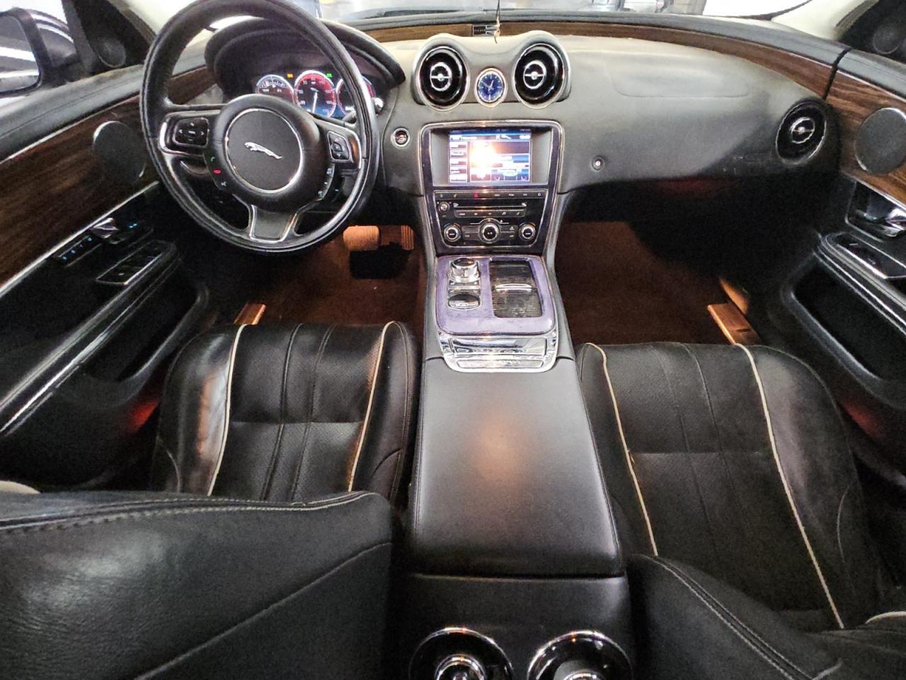 2012 Jaguar Xjl Black vin: SAJWA2GB9CLV28263 Damage: Radio Controls, Inoperable, Repair Required