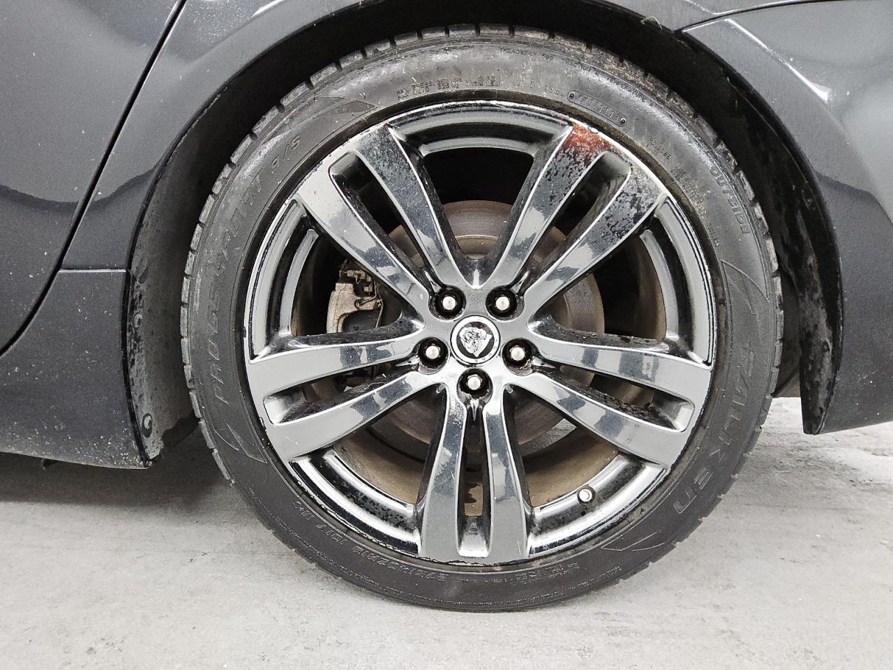2012 Jaguar Xjl Black vin: SAJWA2GB9CLV28263 Damage: Left Rear Wheel, Curb Rash, > 12 Inches