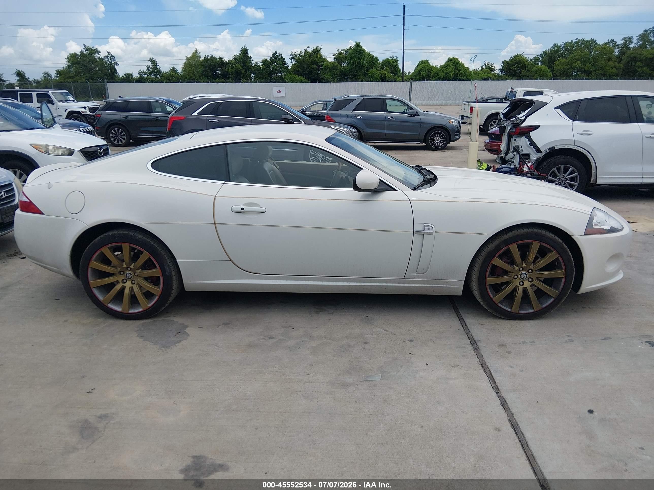 2007 Jaguar Xk   White vin: SAJWA43BX75B11765