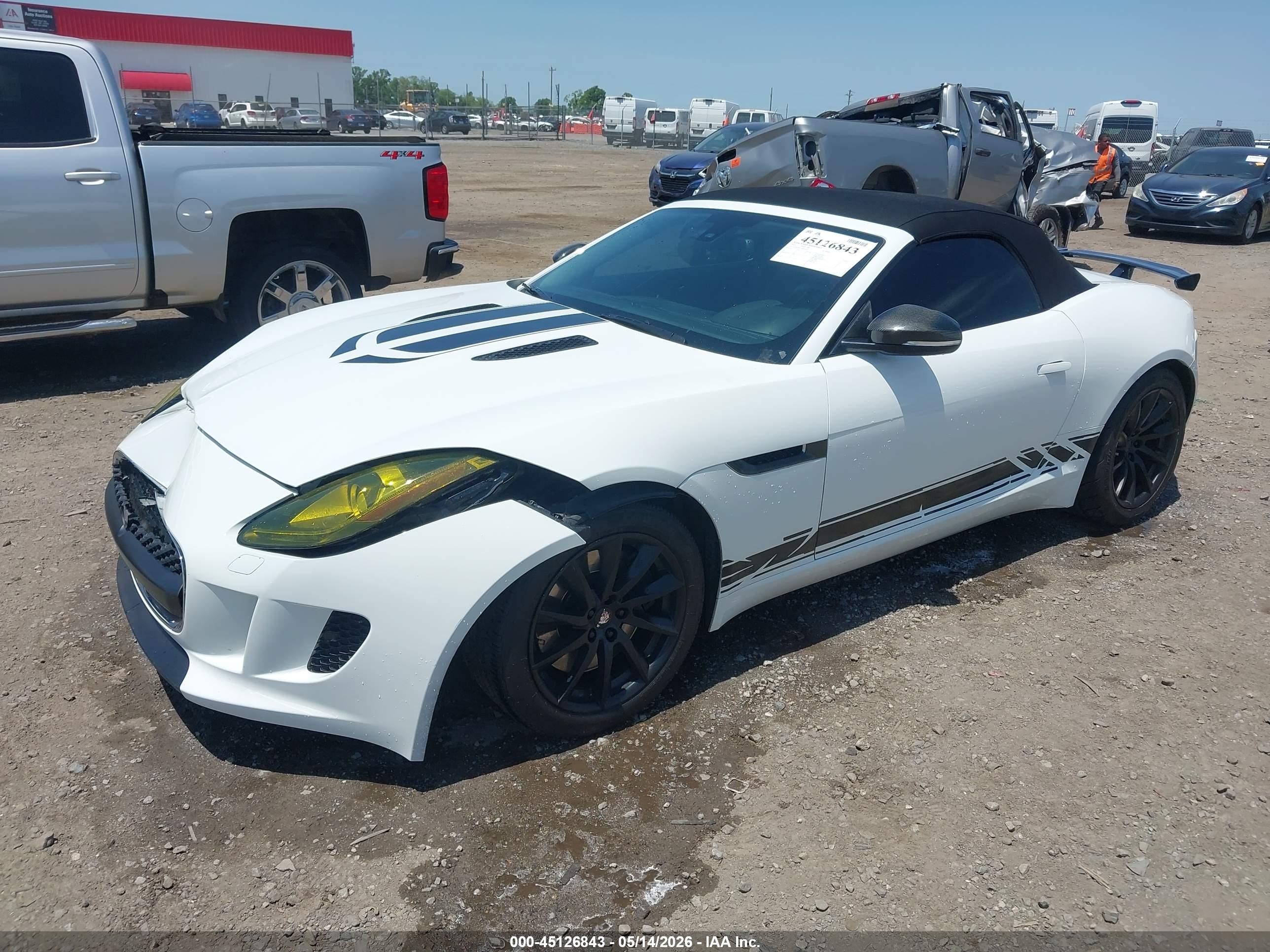2014 Jaguar F-type   White vin: SAJWA6E73E8K00977