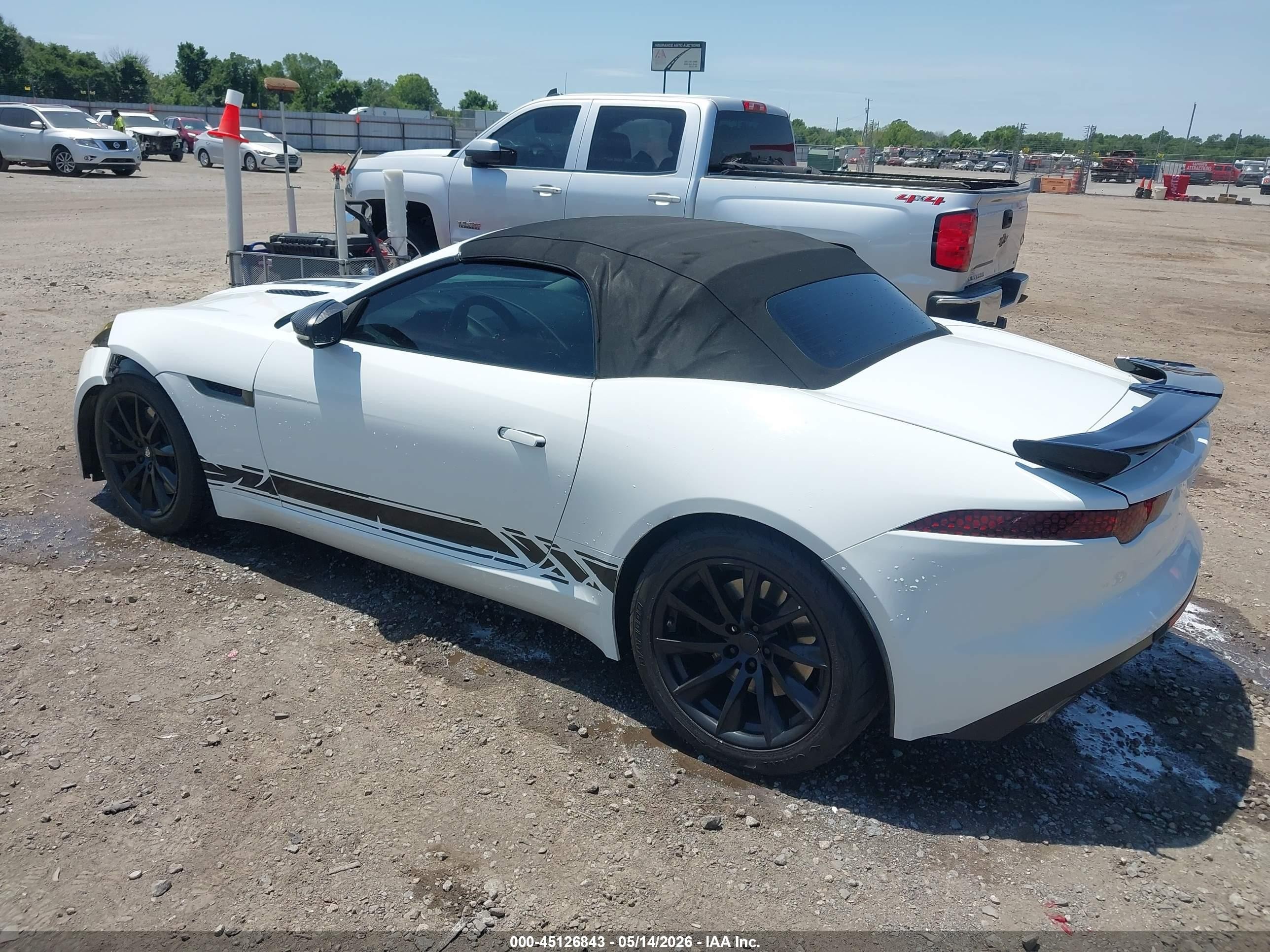 2014 Jaguar F-type   White vin: SAJWA6E73E8K00977