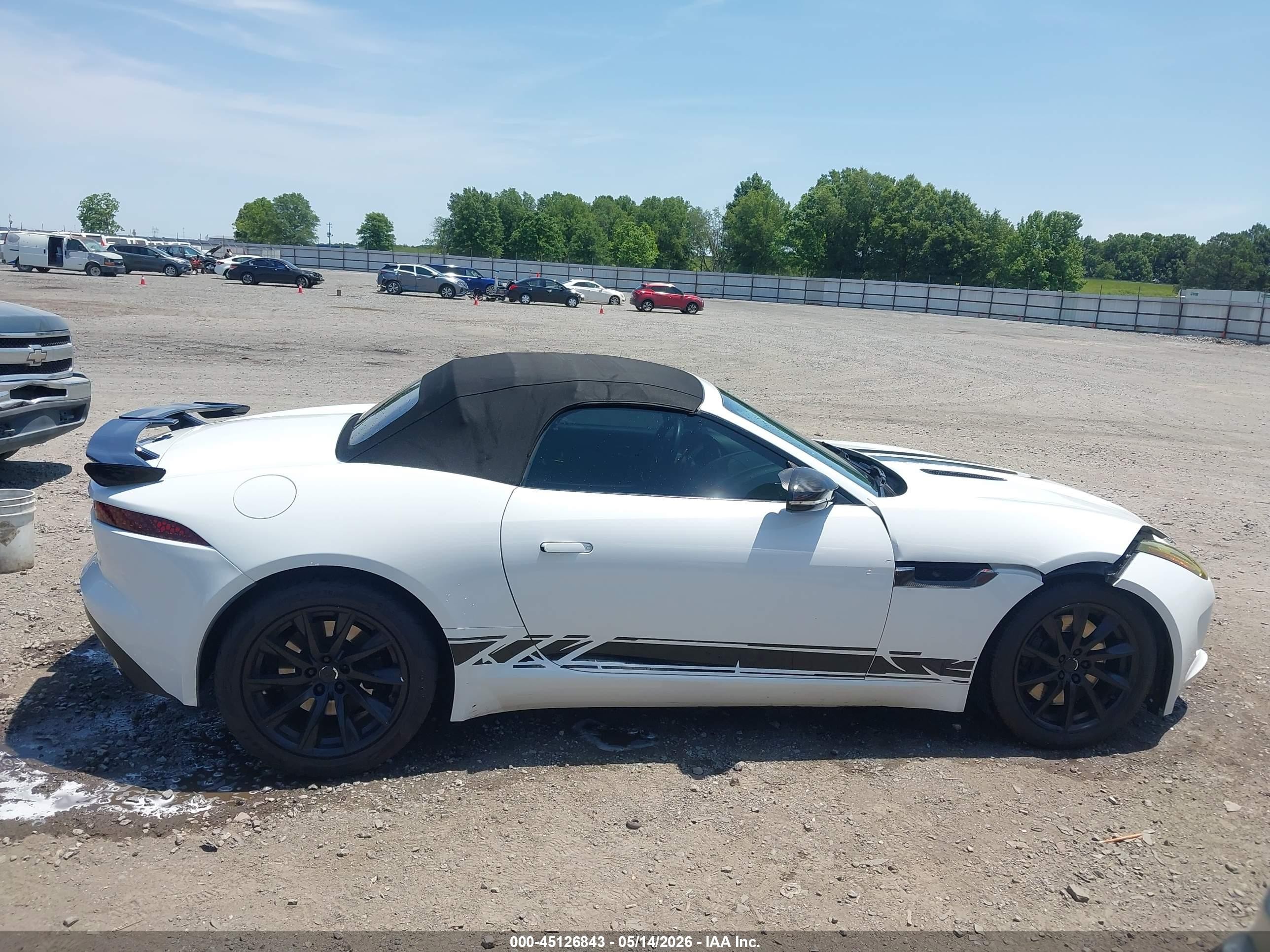 2014 Jaguar F-type   White vin: SAJWA6E73E8K00977
