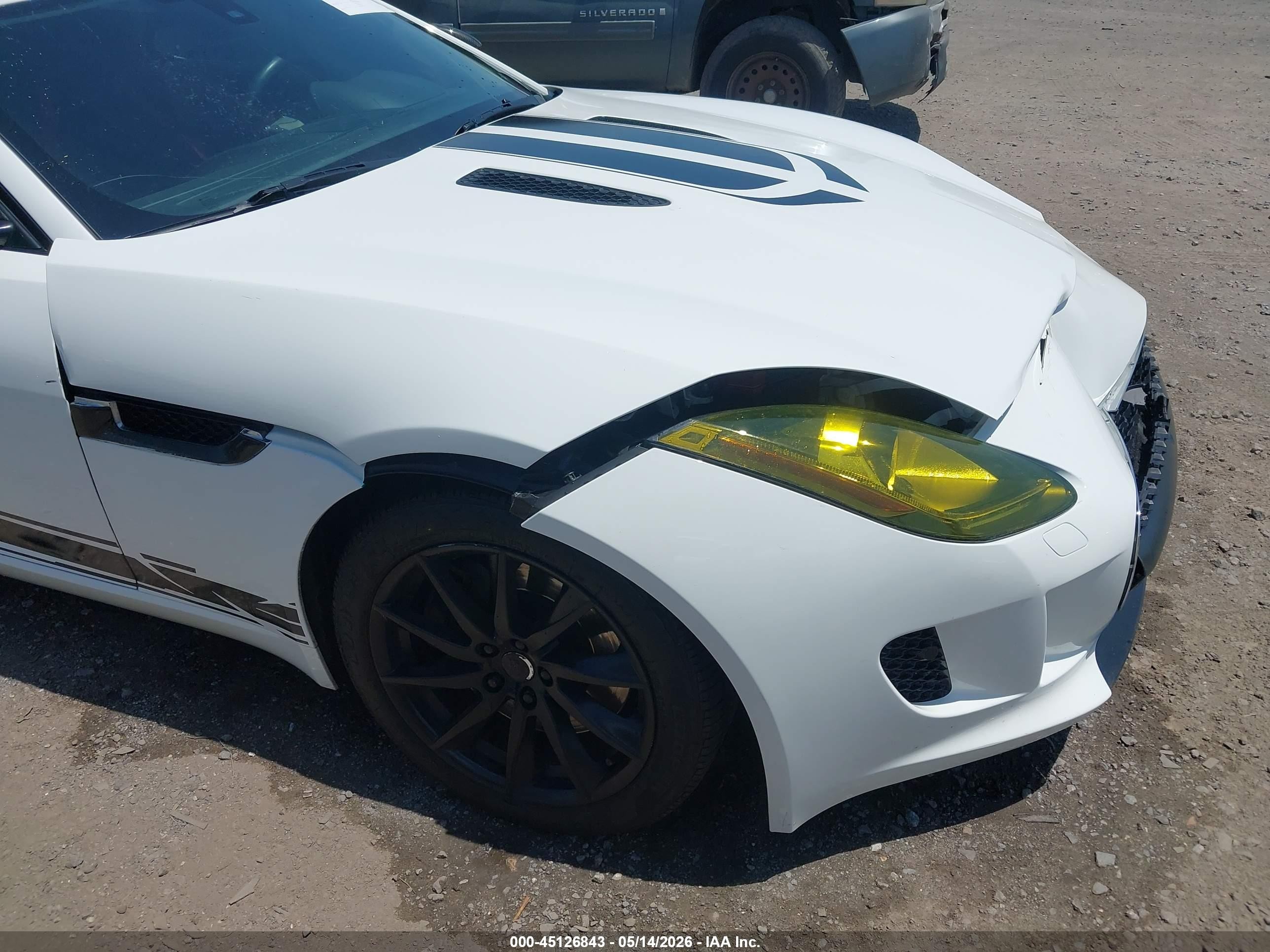 2014 Jaguar F-type   White vin: SAJWA6E73E8K00977