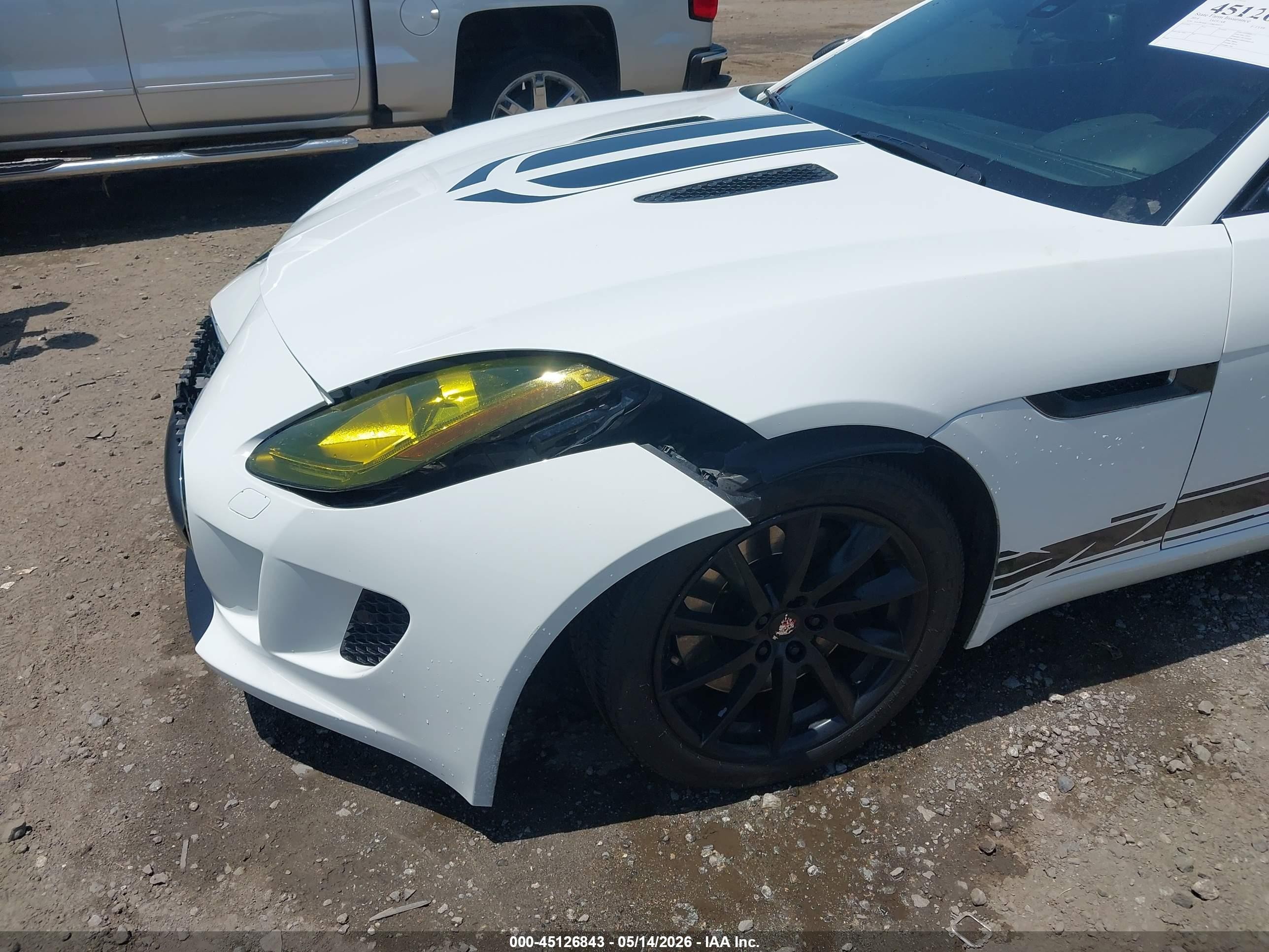 2014 Jaguar F-type   White vin: SAJWA6E73E8K00977