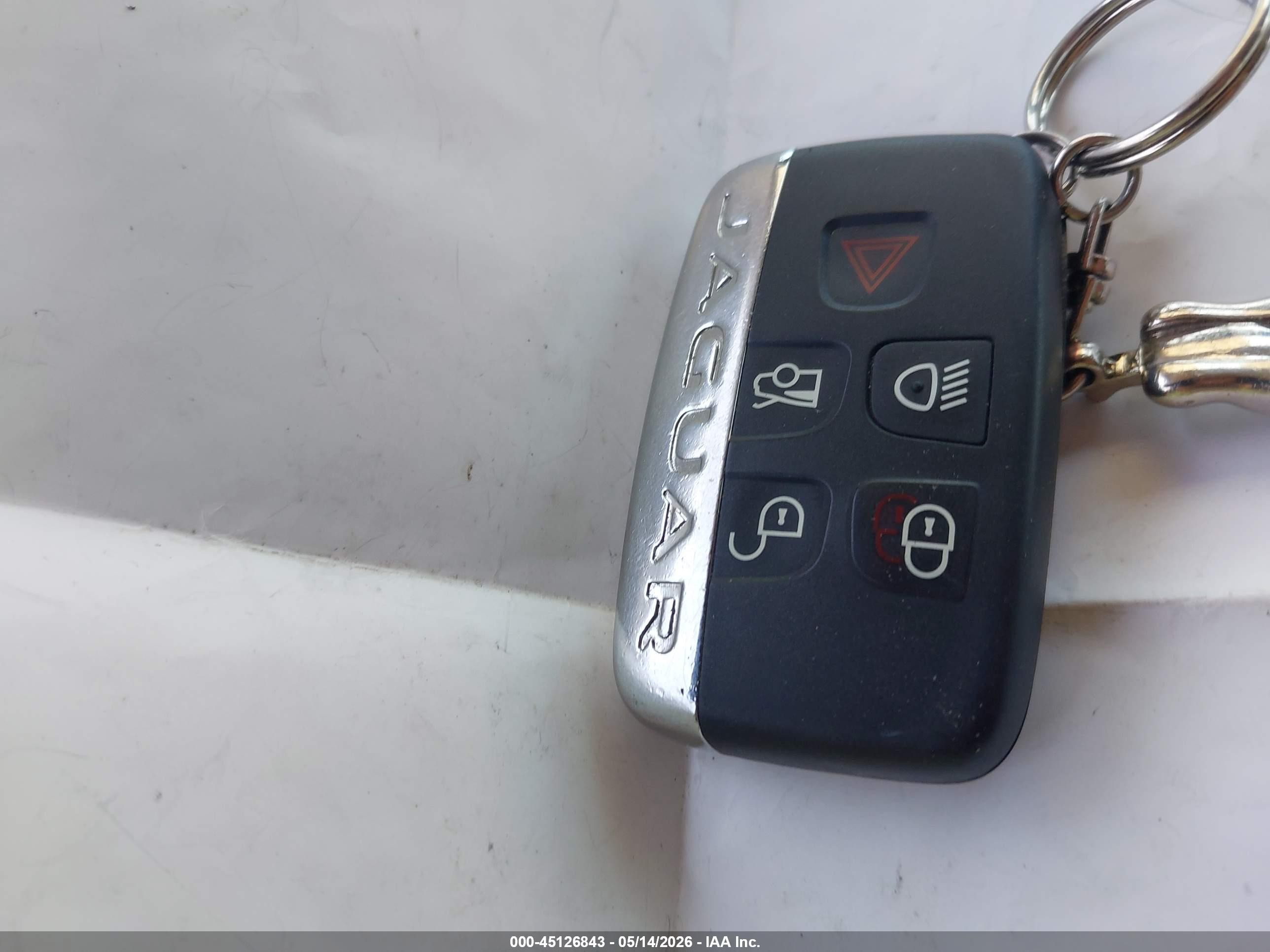 2014 Jaguar F-type   White vin: SAJWA6E73E8K00977