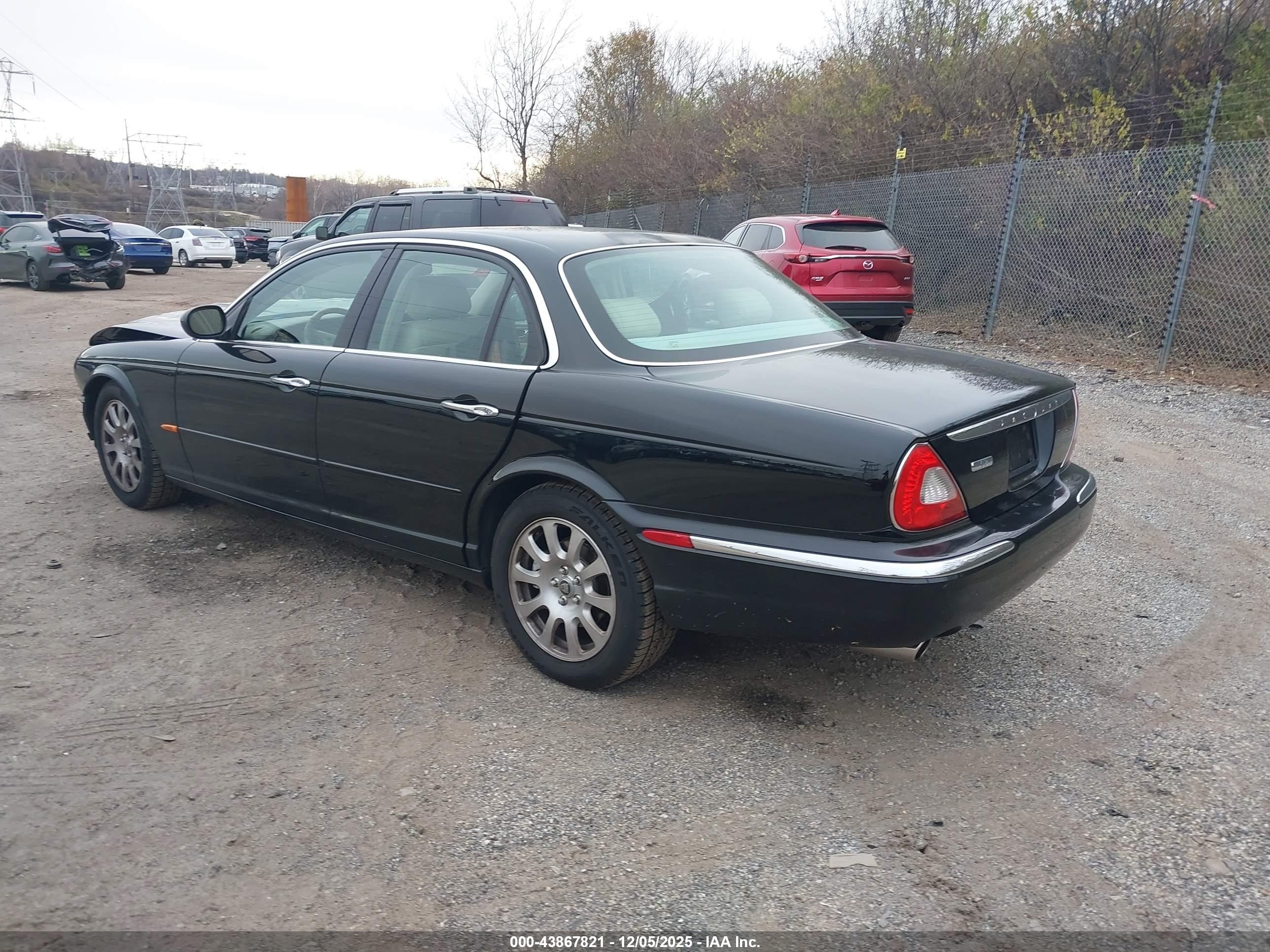 2004 Jaguar Xj Xj8 Black vin: SAJWA71C24SG30173
