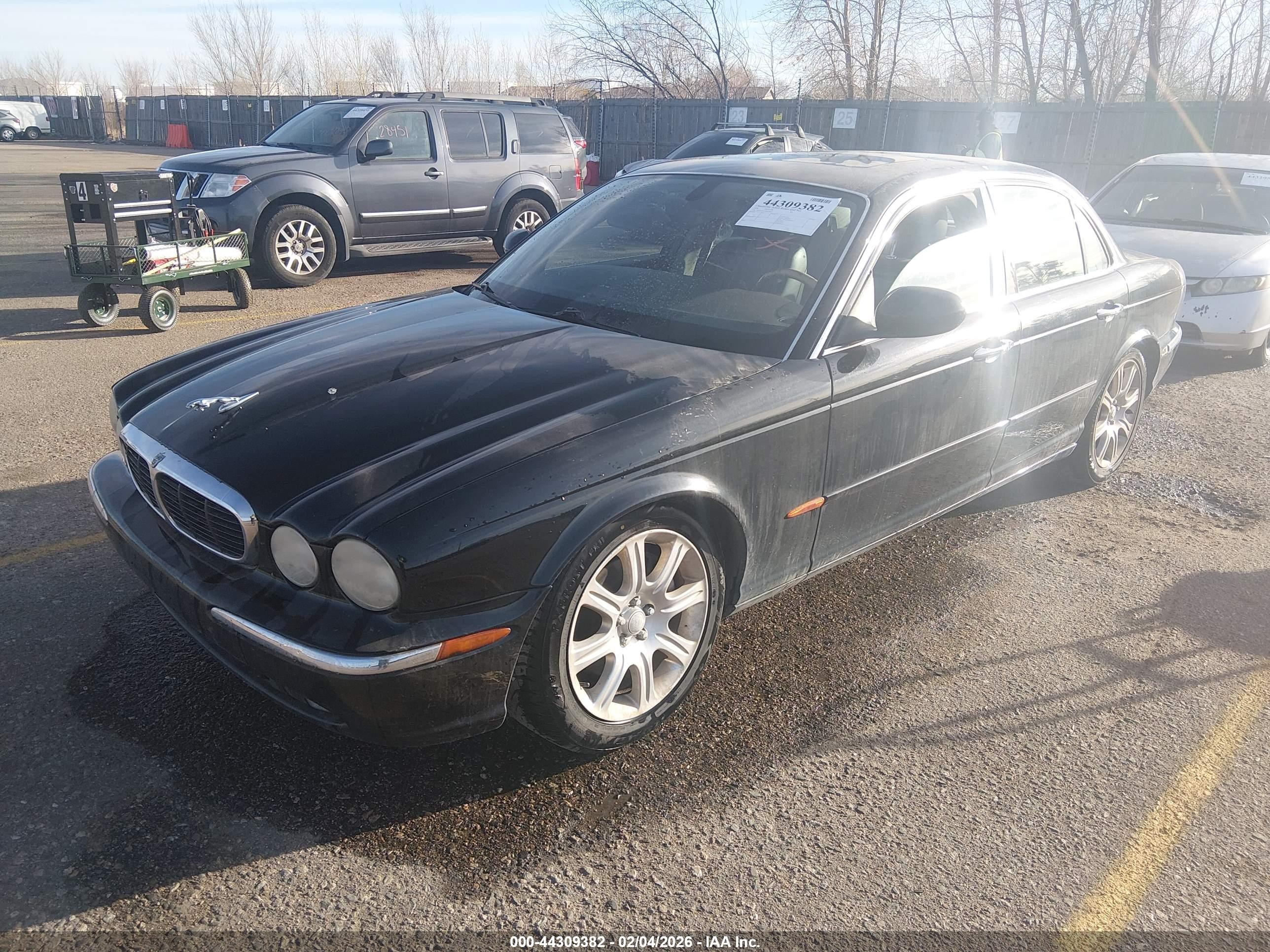 2004 Jaguar Xj Xj8 Black vin: SAJWA71C54SG29017