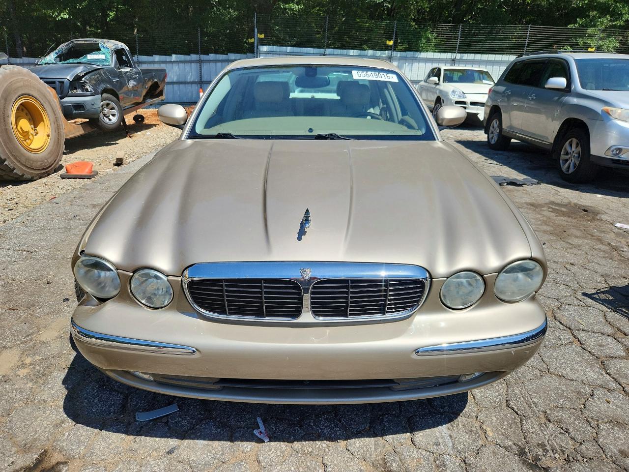 2004 Jaguar Xj8 Gold vin: SAJWA71C94SG29974