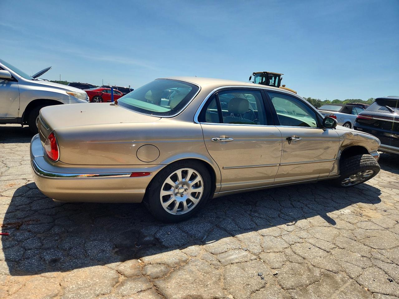 2004 Jaguar Xj8 Gold vin: SAJWA71C94SG29974