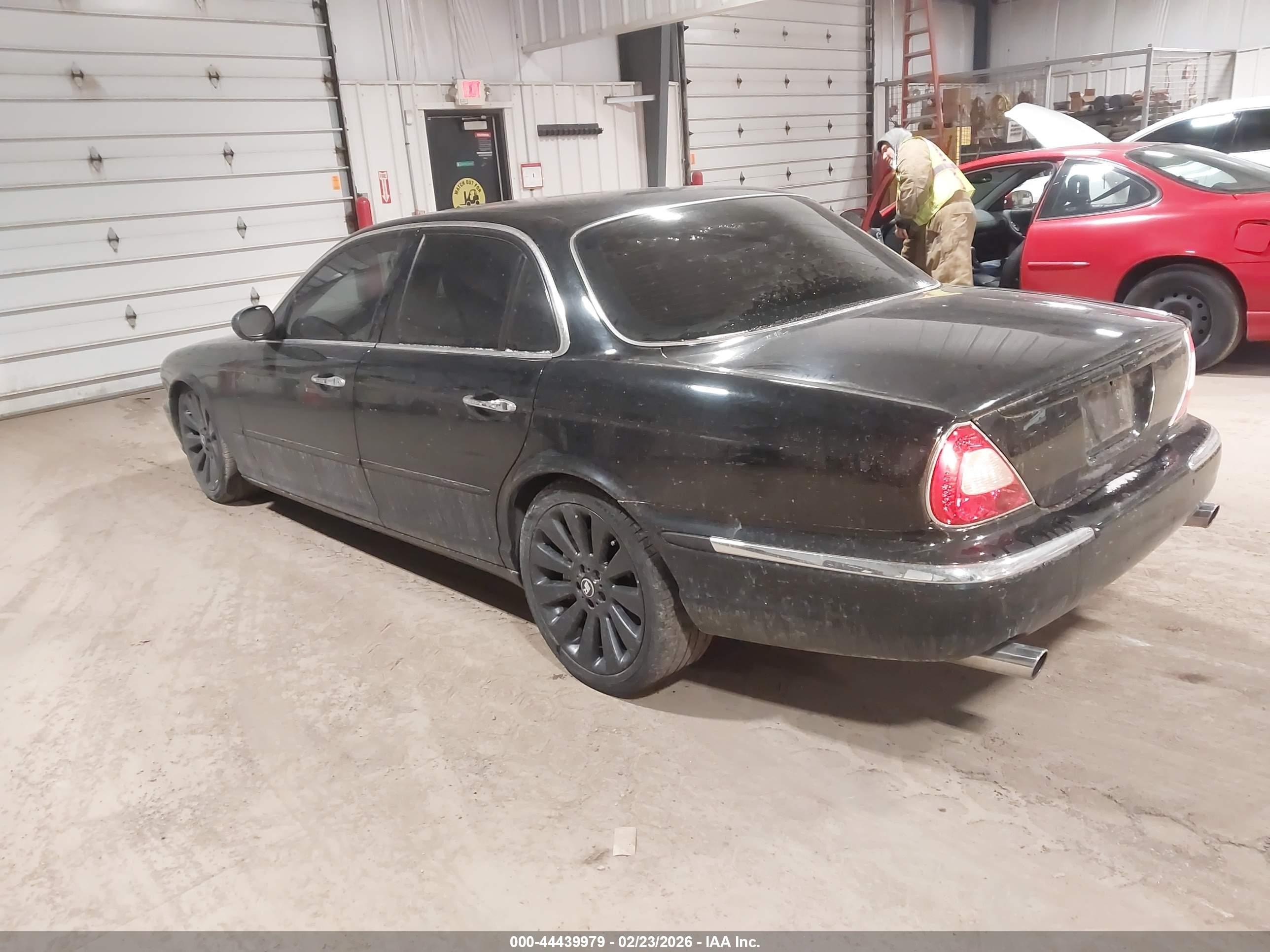 2004 Jaguar Xj Xjr Black vin: SAJWA73B24TG16899