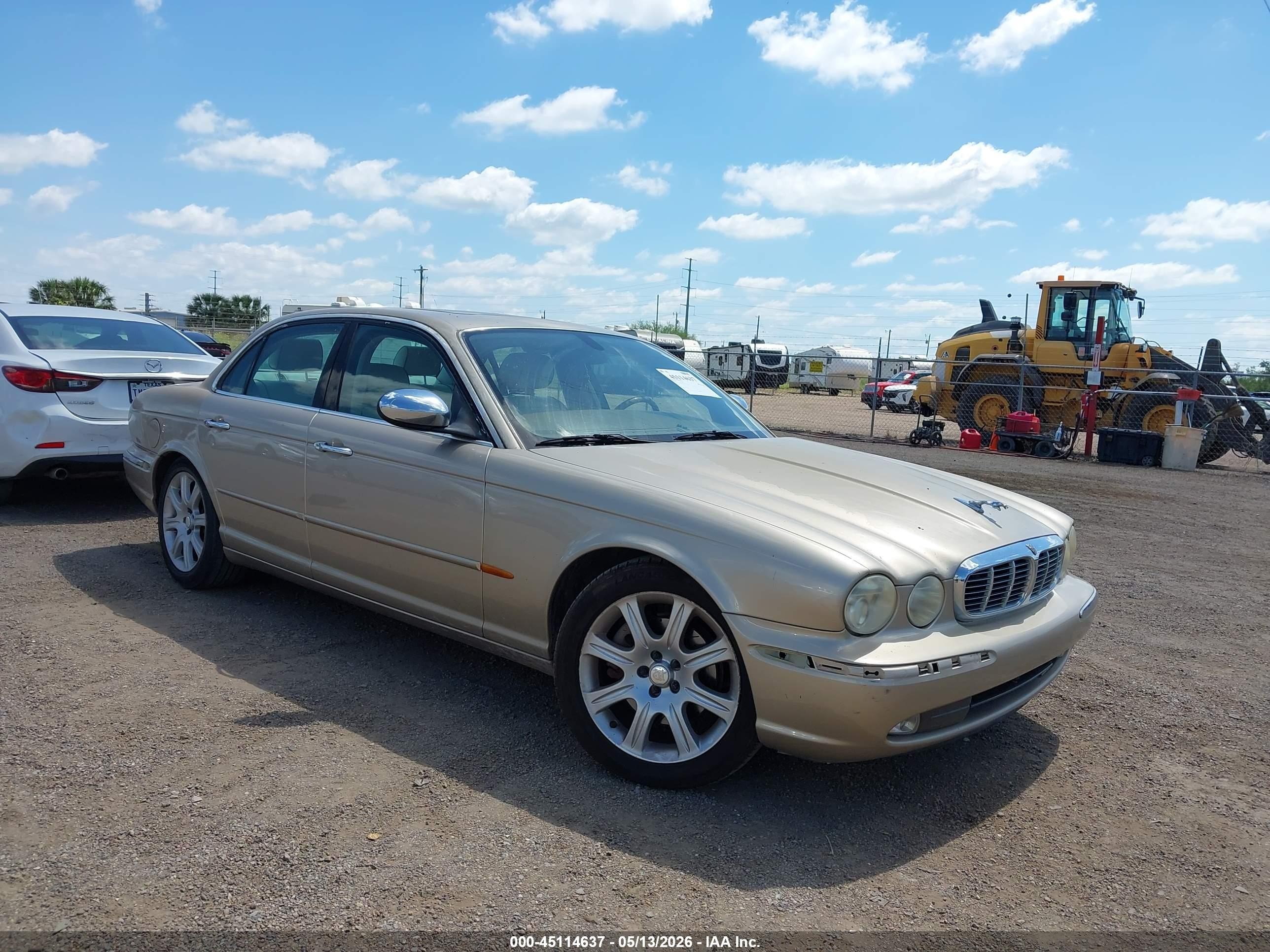 2004 Jaguar Xj Vanden Plas Gold vin: SAJWA74C64SG19947
