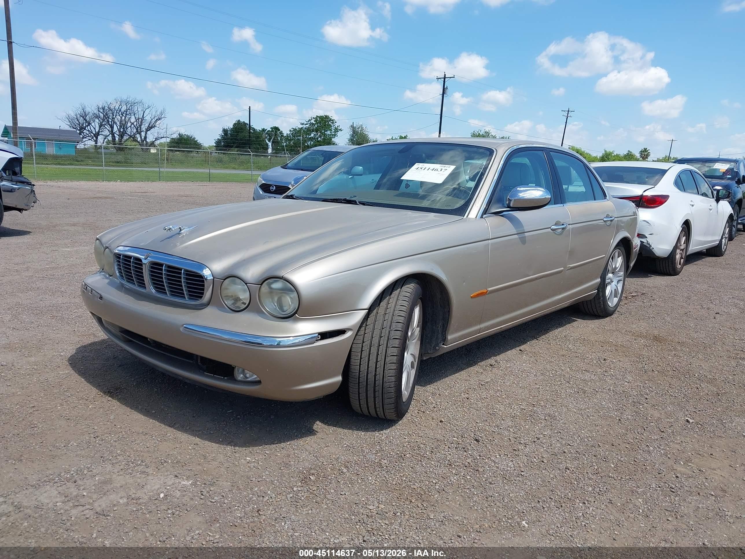 2004 Jaguar Xj Vanden Plas Gold vin: SAJWA74C64SG19947