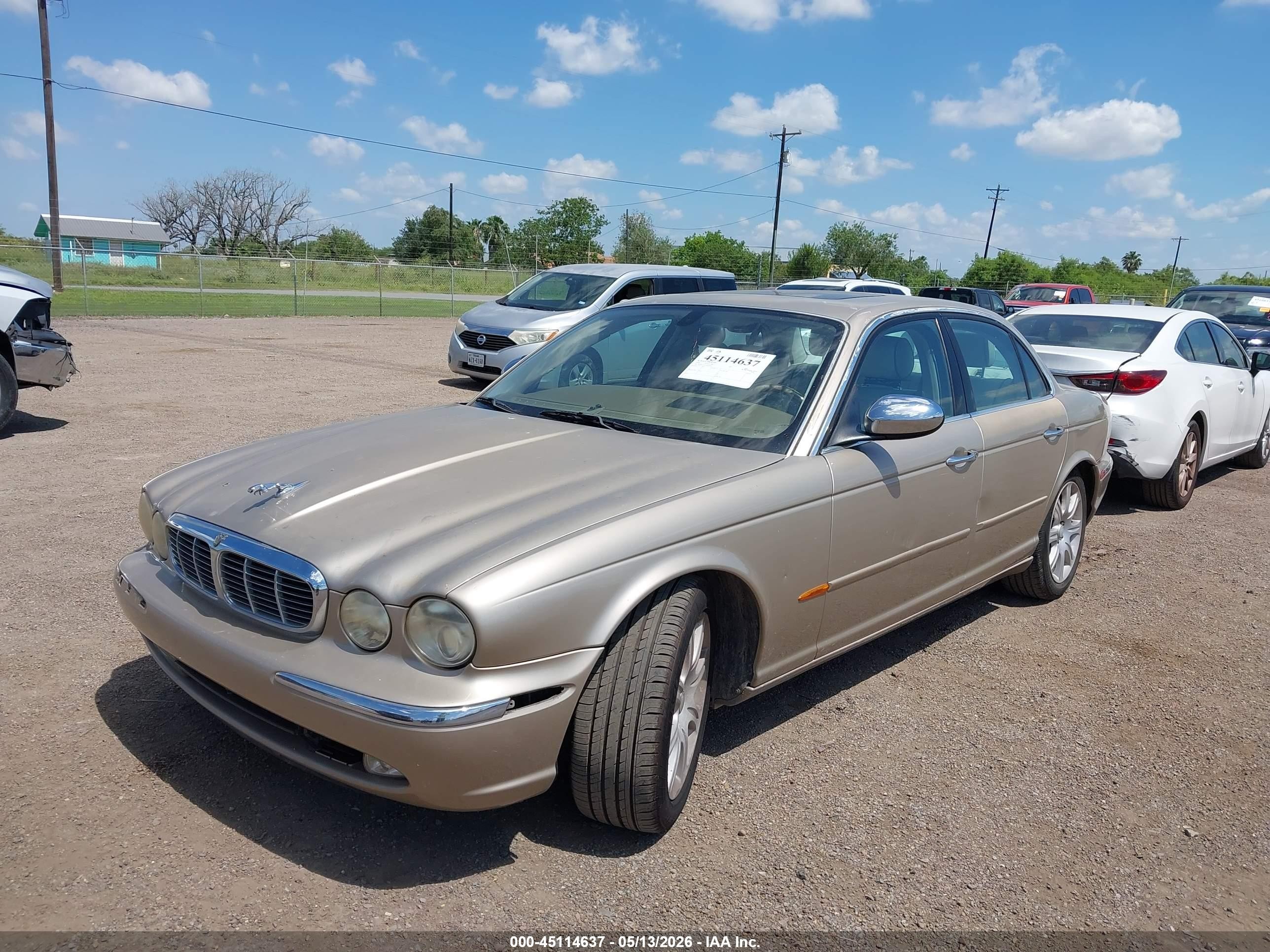 2004 Jaguar Xj Vanden Plas Gold vin: SAJWA74C64SG19947