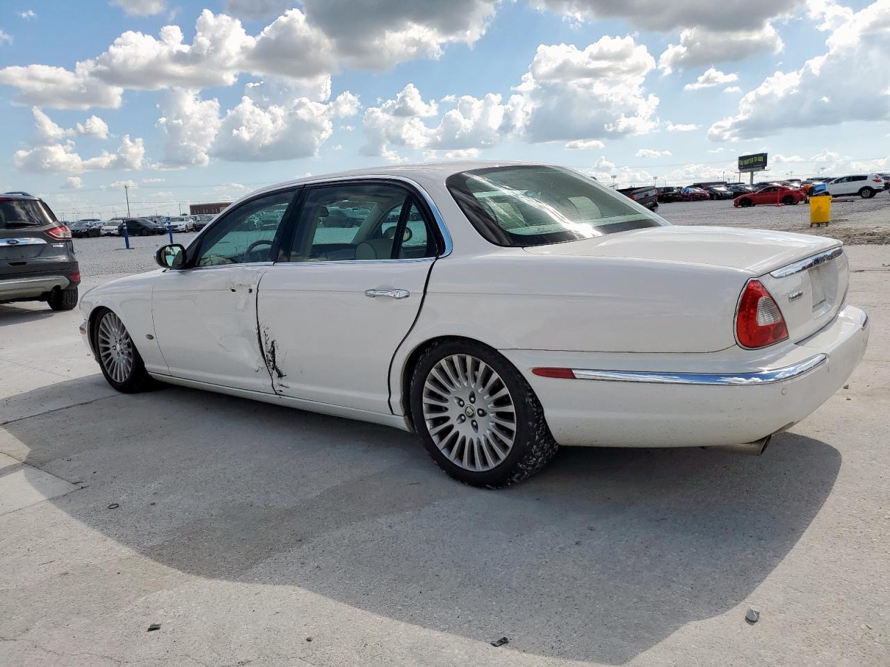 2006 Jaguar Vandenplas    White vin: SAJWA82B16SH06996