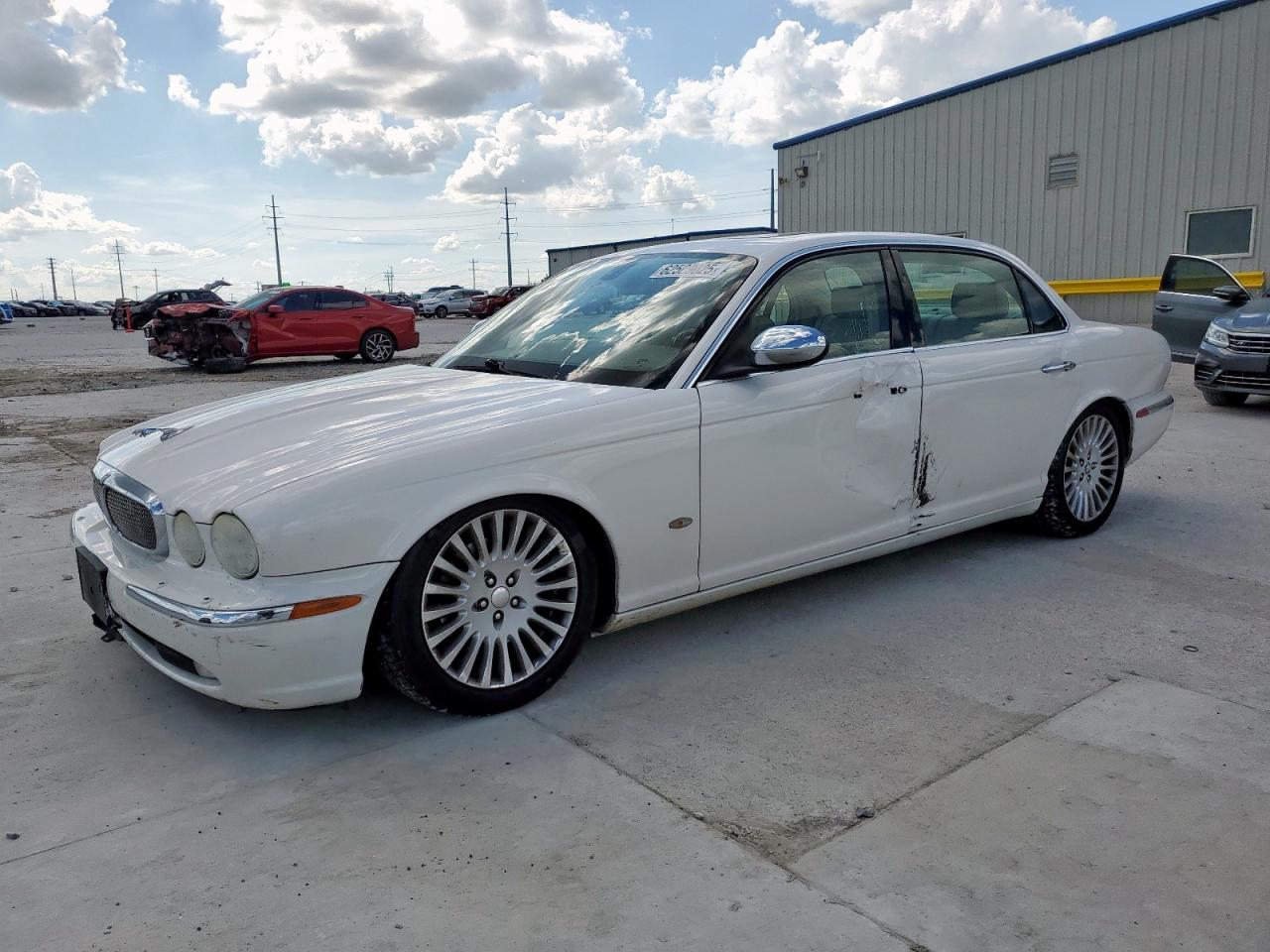 2006 Jaguar Vandenplas    White vin: SAJWA82B16SH06996