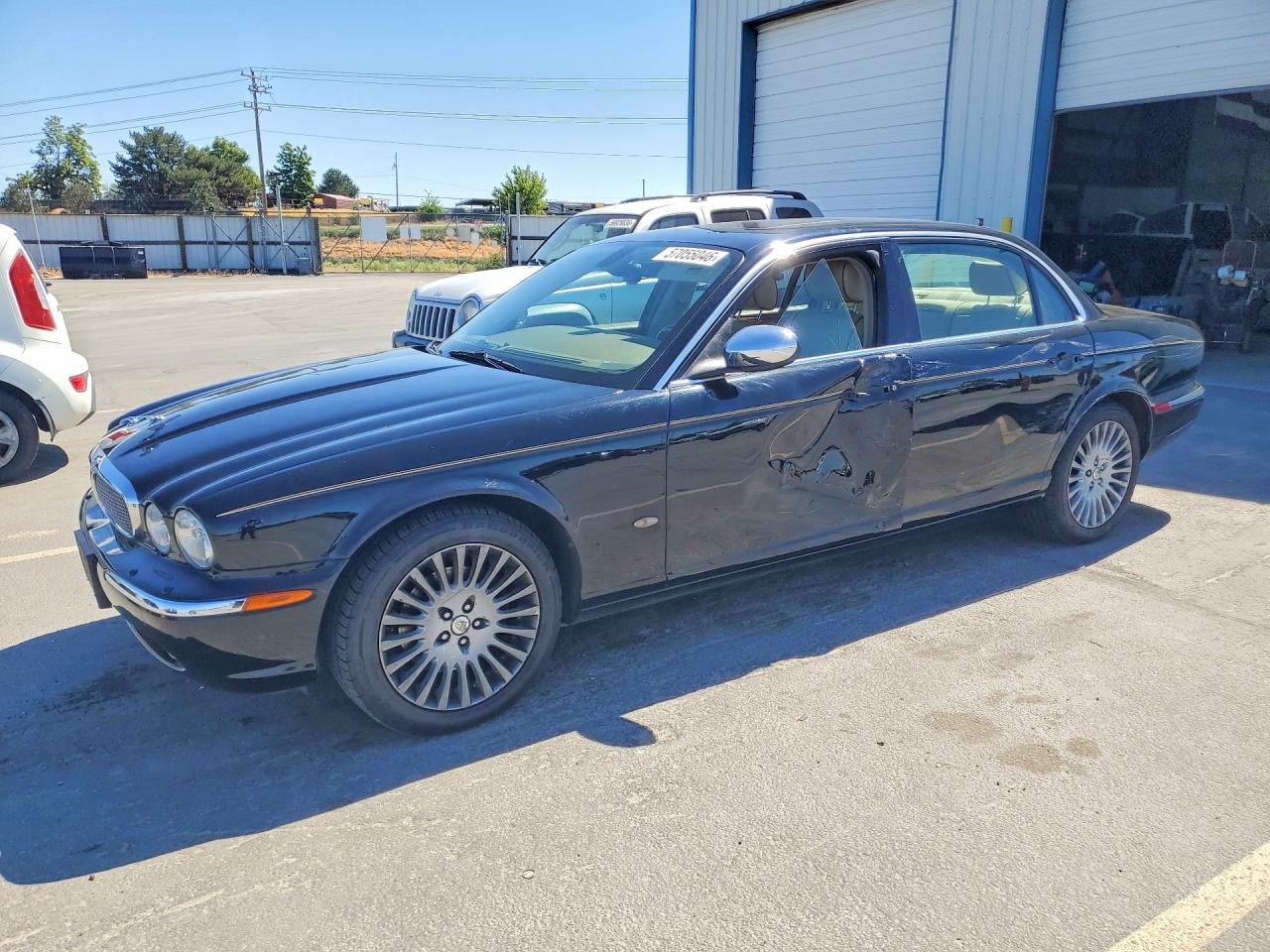 2006 Jaguar Vandenplas Black vin: SAJWA82B56SH11196