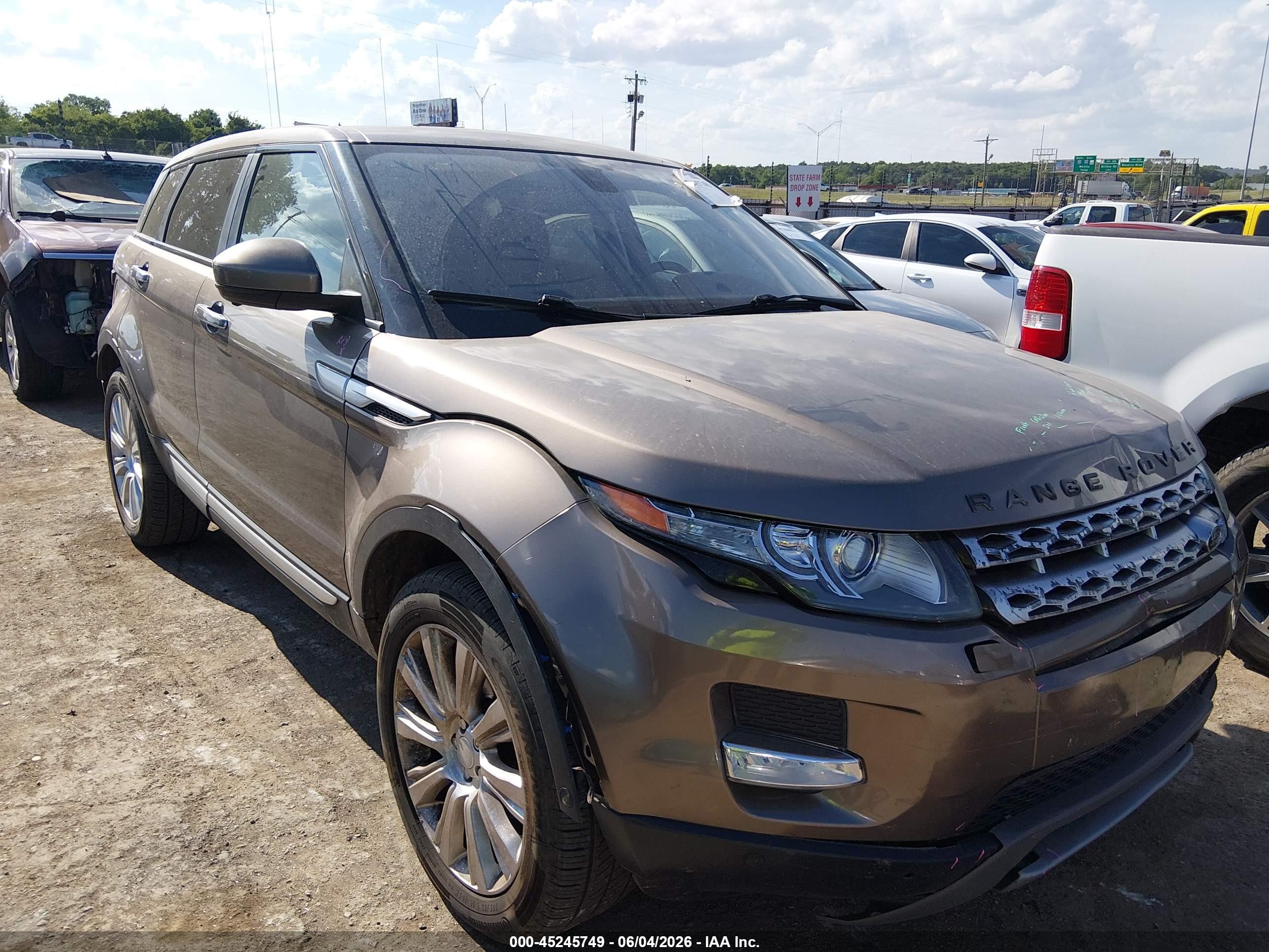 2015 Land Rover Range Rover Evoque Prestige Бежевый vin: SALVV2BG3FH051511