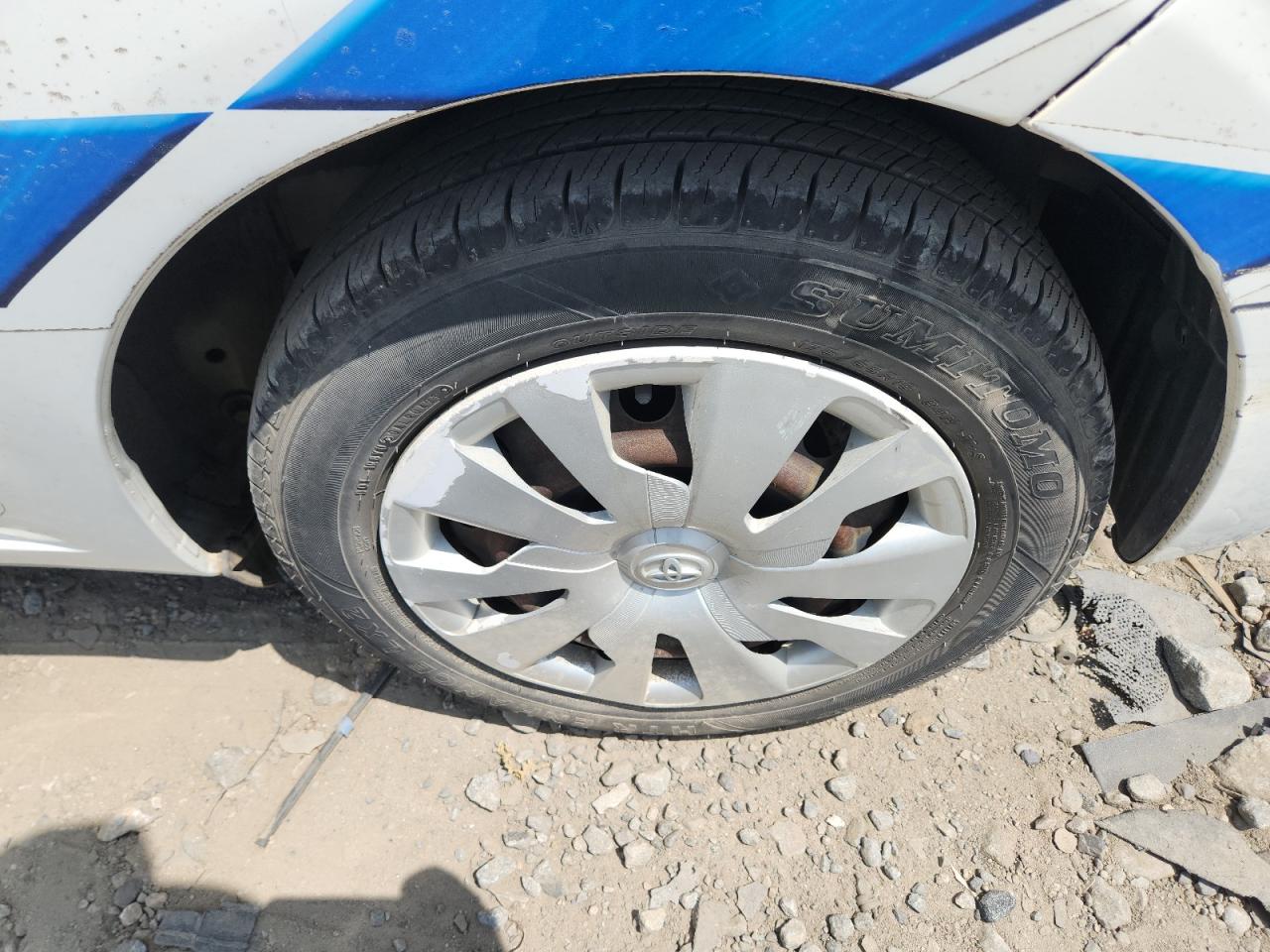 2015 Toyota Yaris 3-door L Two Tone vin: VNKJTUD3XFA021987 Damage: Left Rear Wheel Cover, Curb Rash, > 12 Inches