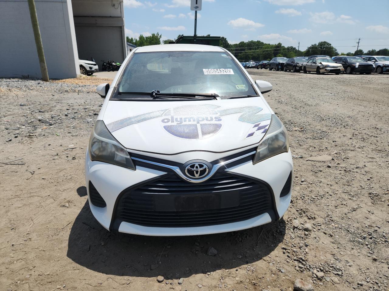 2015 Toyota Yaris 3-door L Two Tone vin: VNKJTUD3XFA021987 Damage: Left Head Lamp, Faded, Repair Required