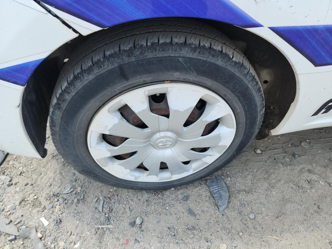 2015 Toyota Yaris 3-door L Two Tone vin: VNKJTUD3XFA021987 Damage: Right Rear Wheel Cover, Curb Rash, > 12 Inches
