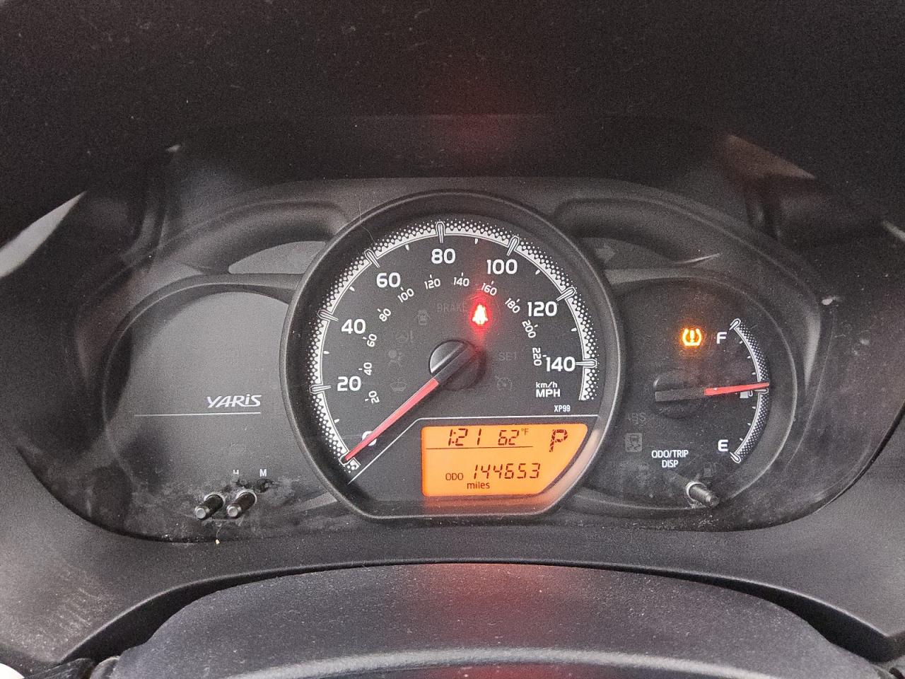 2015 Toyota Yaris 5-door L Black vin: VNKKTUD35FA042301 Damage: Warning - Tire Pressure, On, Unacceptable