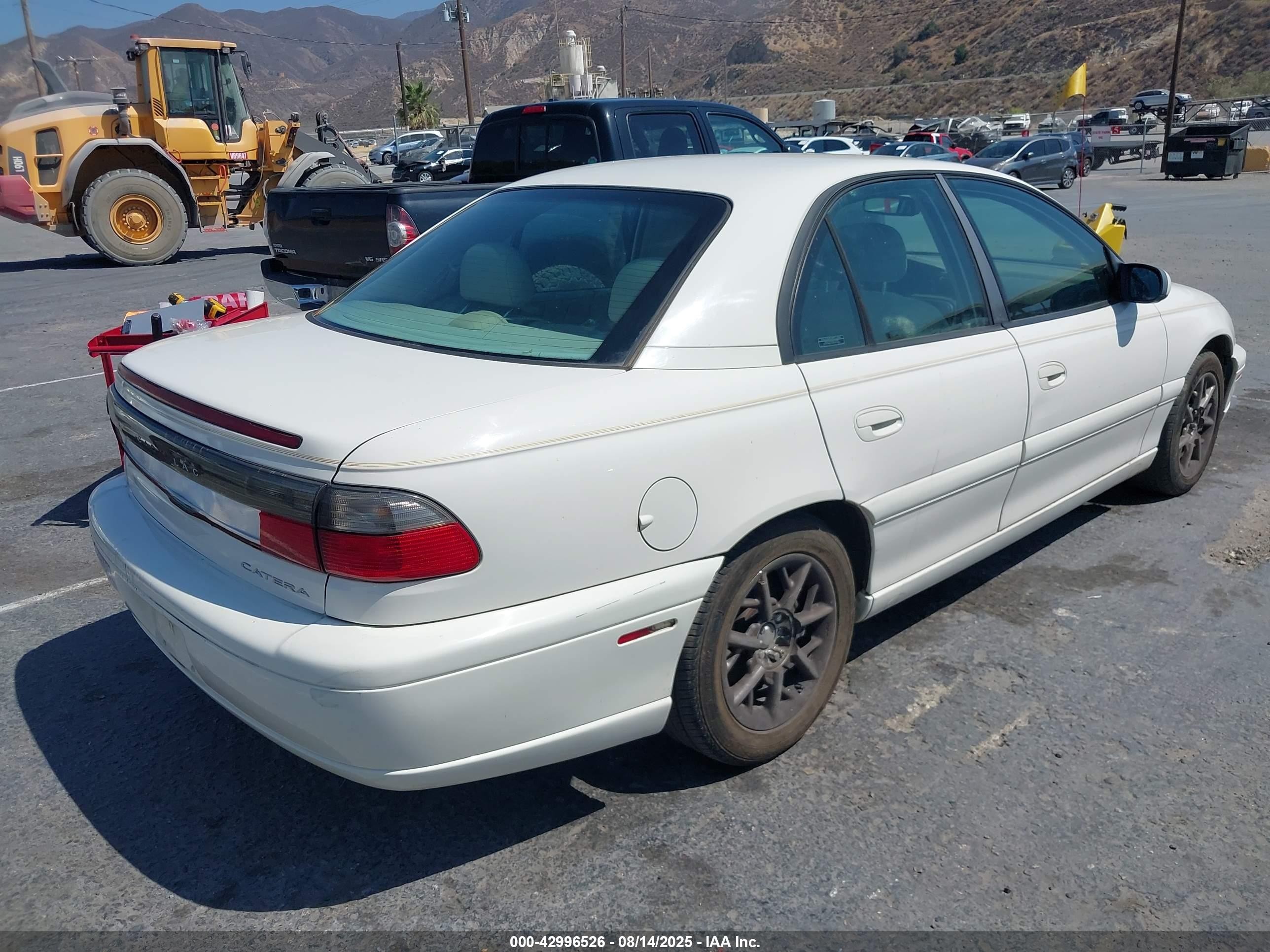 1998 Cadillac Catera   White vin: W06VR52R8WR132613