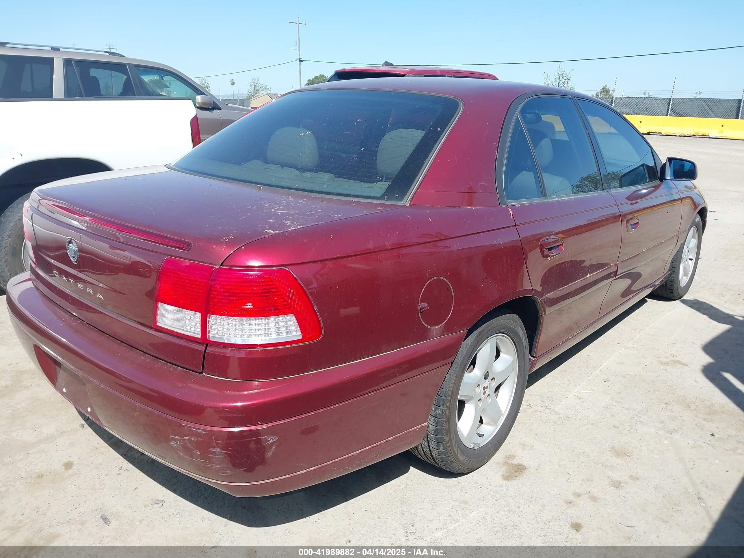 2001 Cadillac Catera Standard Red vin: W06VR54R01R003061