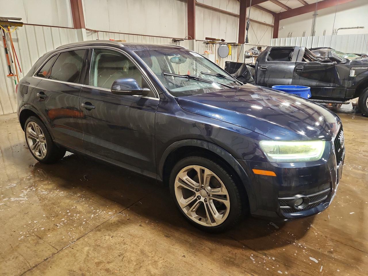 2015 Audi Q3 Premium Plus Blue vin: WA1EFCFS6FR003630
