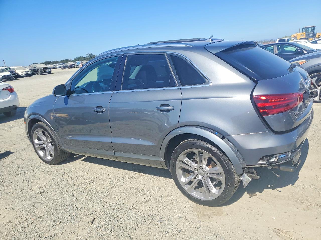 2015 Audi Q3 Prestige Blue vin: WA1GFCFS9FR000441