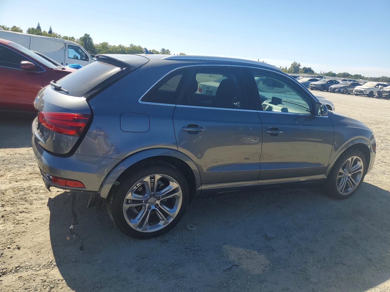 2015 Audi Q3 Prestige Blue vin: WA1GFCFS9FR000441