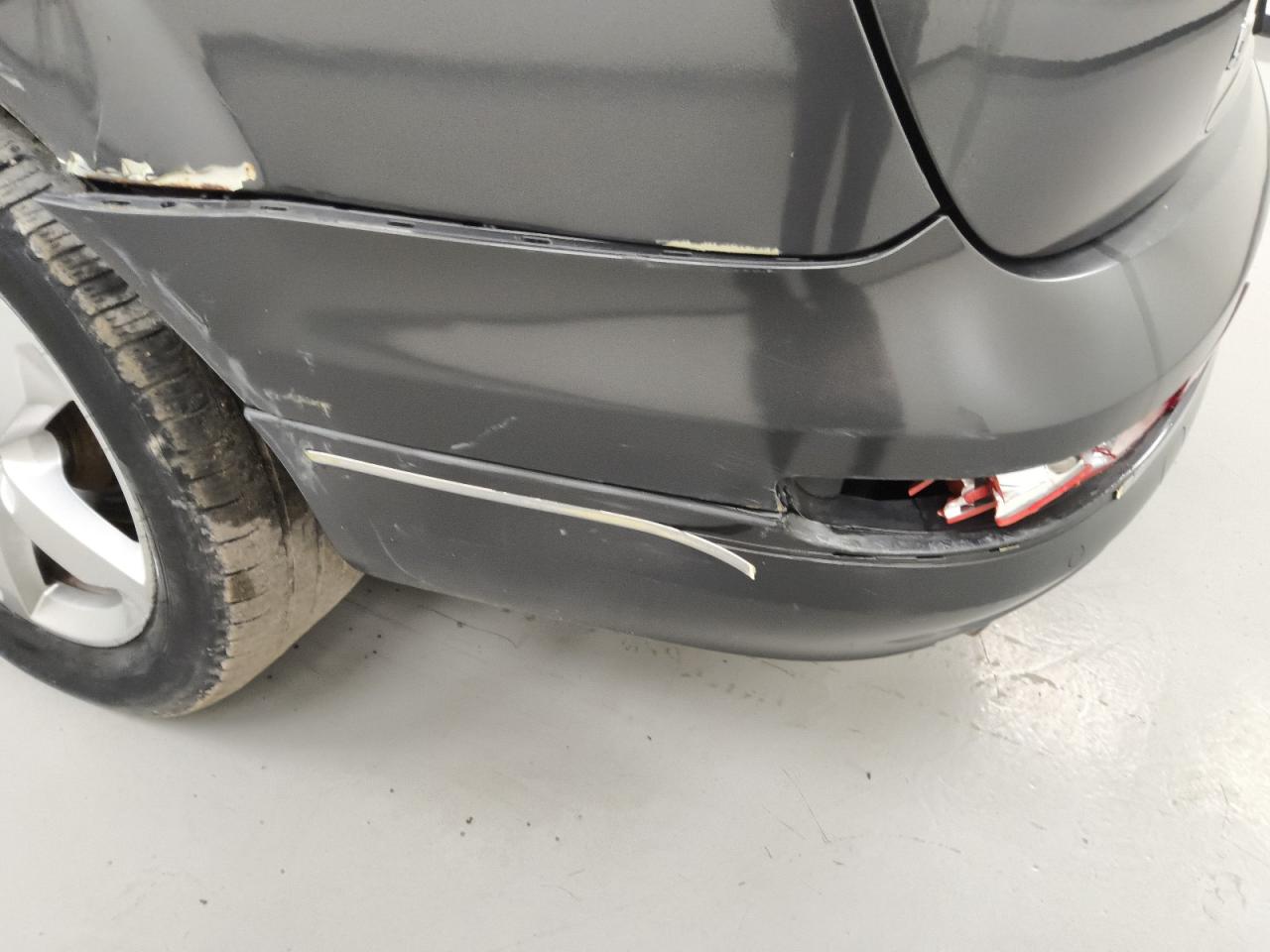 2015 Audi Q7 Premium Plus Gray vin: WA1LGAFEXFD016963 Damage: Rear Bumper, Dent(S) W/ Paint Dmg, > 12 Inches