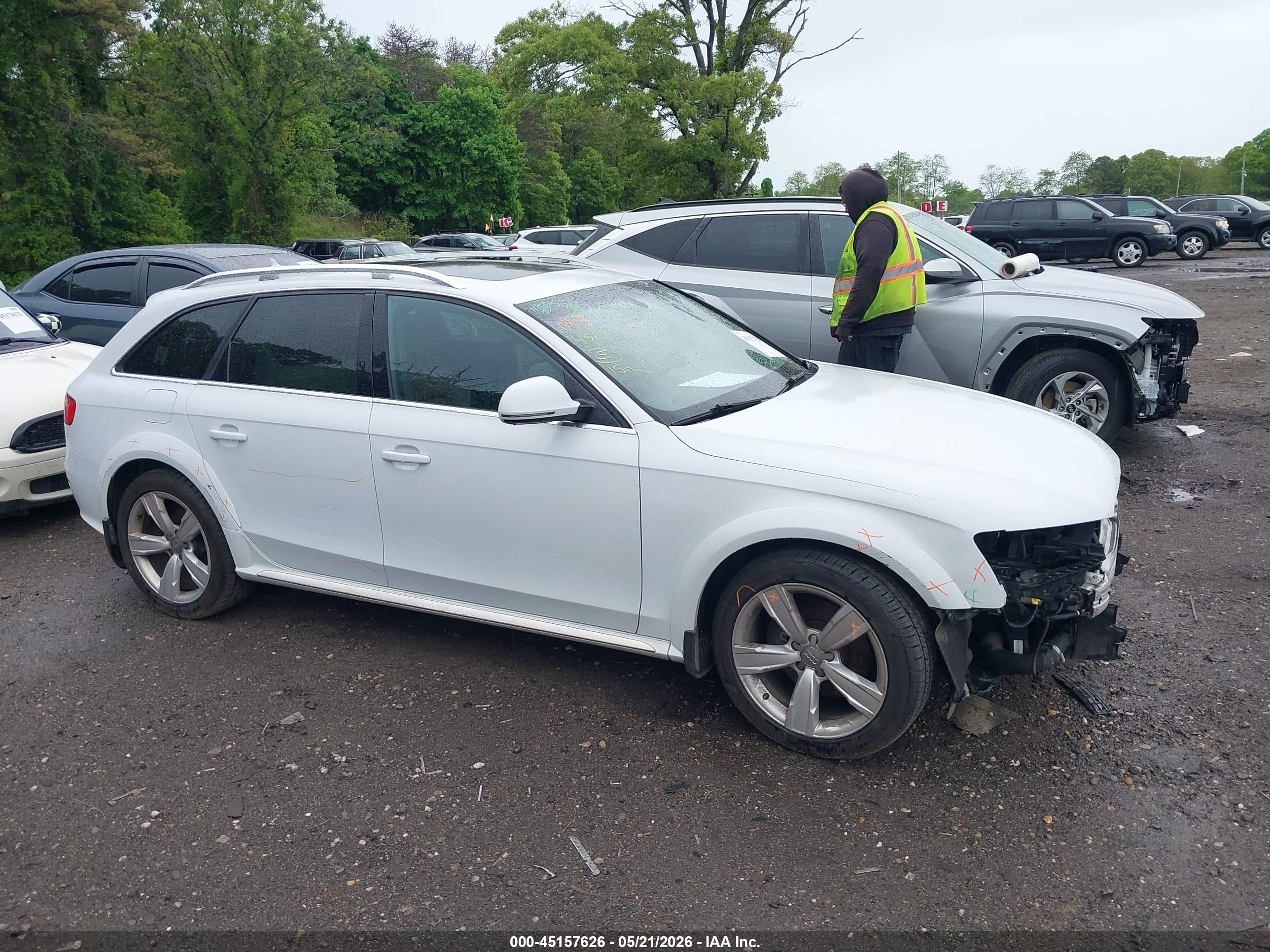 2015 Audi Allroad 2.0t Premium Белый vin: WA1UFAFL3FA071651