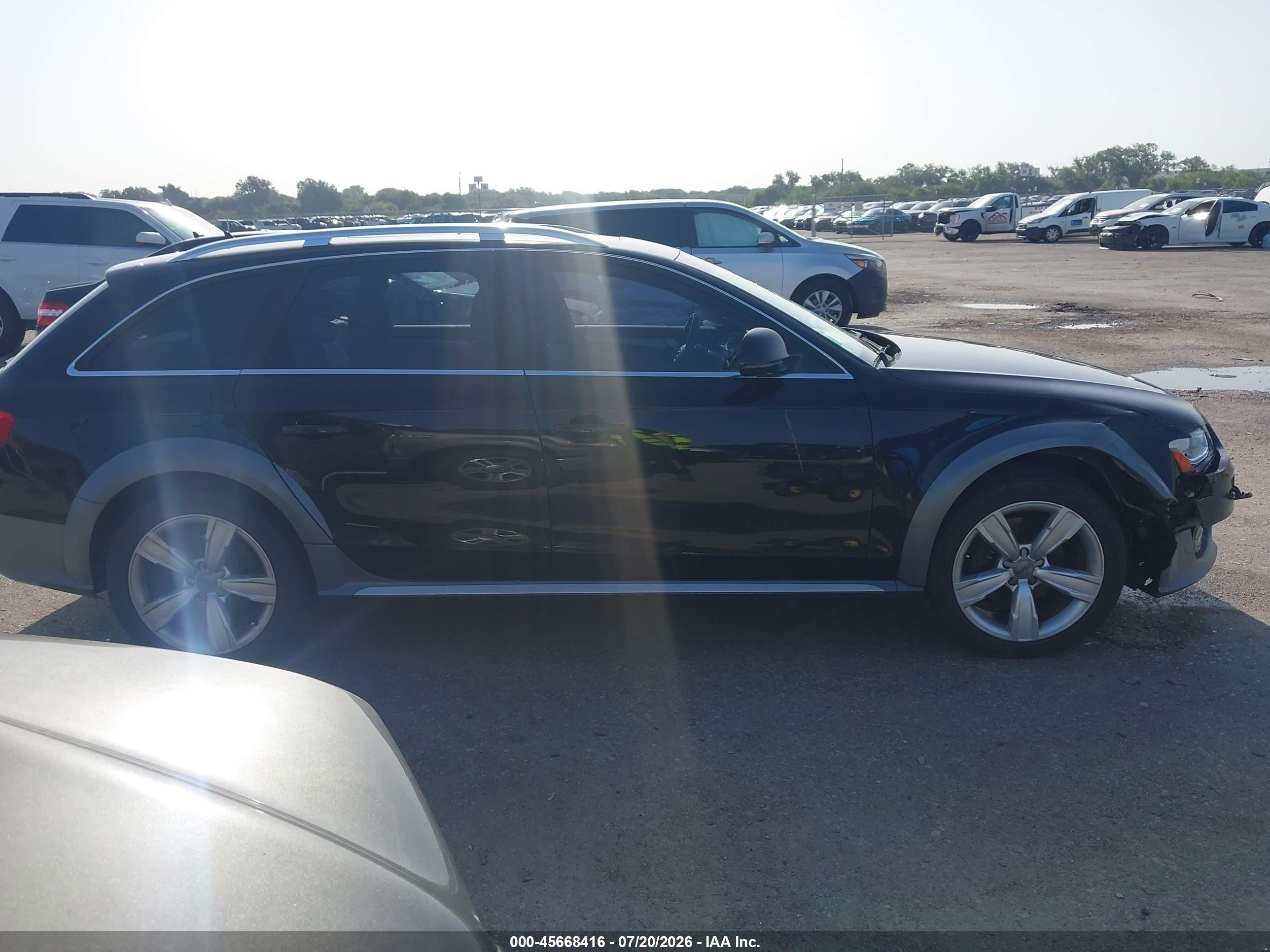 2014 Audi Allroad 2.0t Premium Черный vin: WA1UFAFL8EA165801
