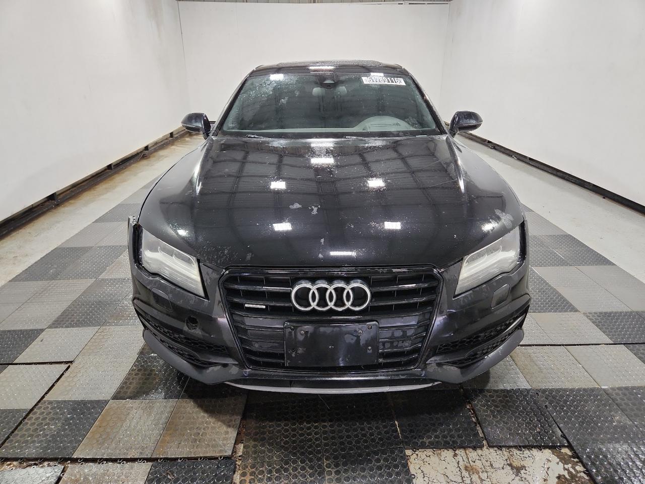 2015 Audi A7 Prestige Black vin: WAU2GAFCXFN032958 Damage: Front Bumper, Loose, Repair Required