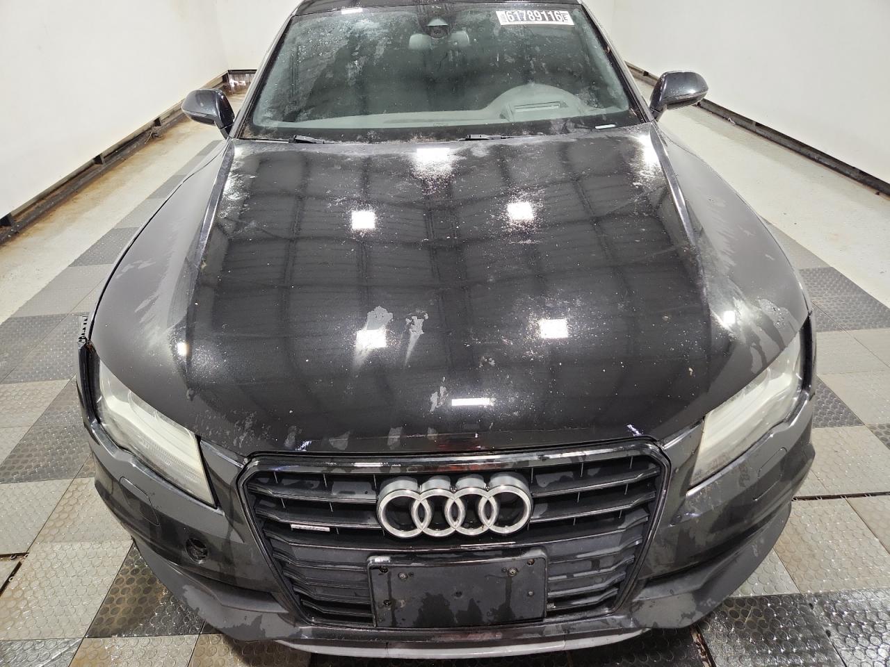 2015 Audi A7 Prestige Black vin: WAU2GAFCXFN032958 Damage: Left Head Lamp, Faded, Repair Required
