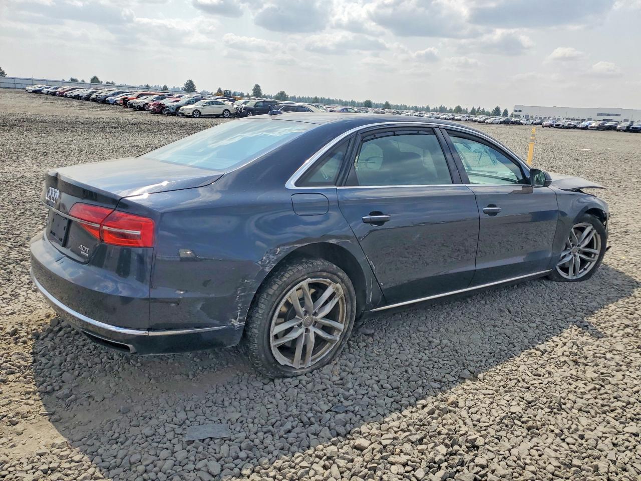 2015 Audi A8 L Quattro Черный vin: WAU32AFD9FN005519