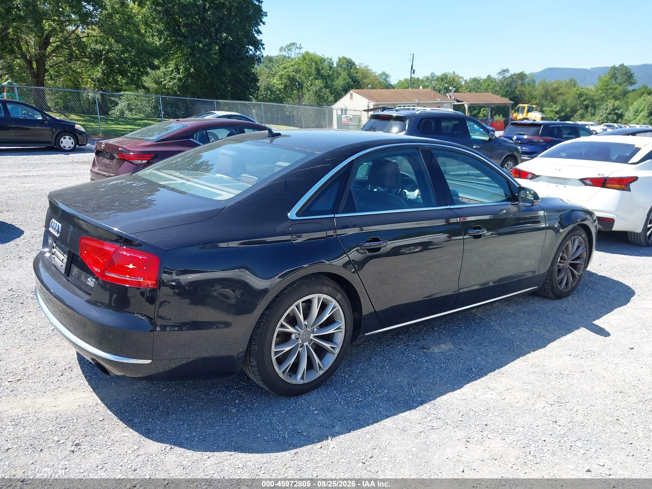 2011 Audi A8 4.2 (tiptronic) Черный vin: WAUAVAFD5BN021421