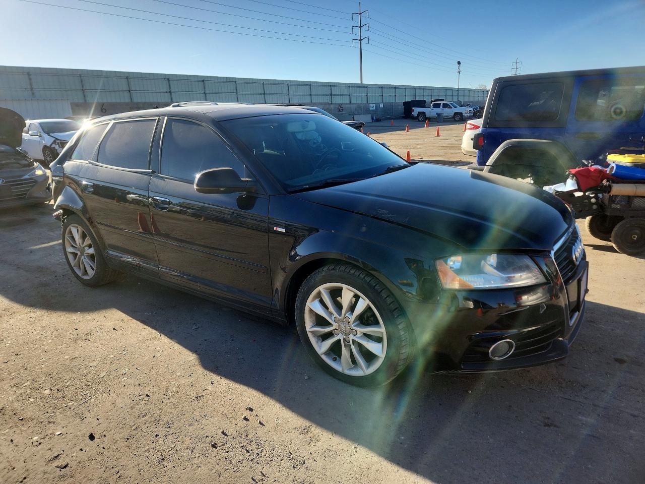 2012 Audi A3 Premium Black vin: WAUBJAFM8CA138354