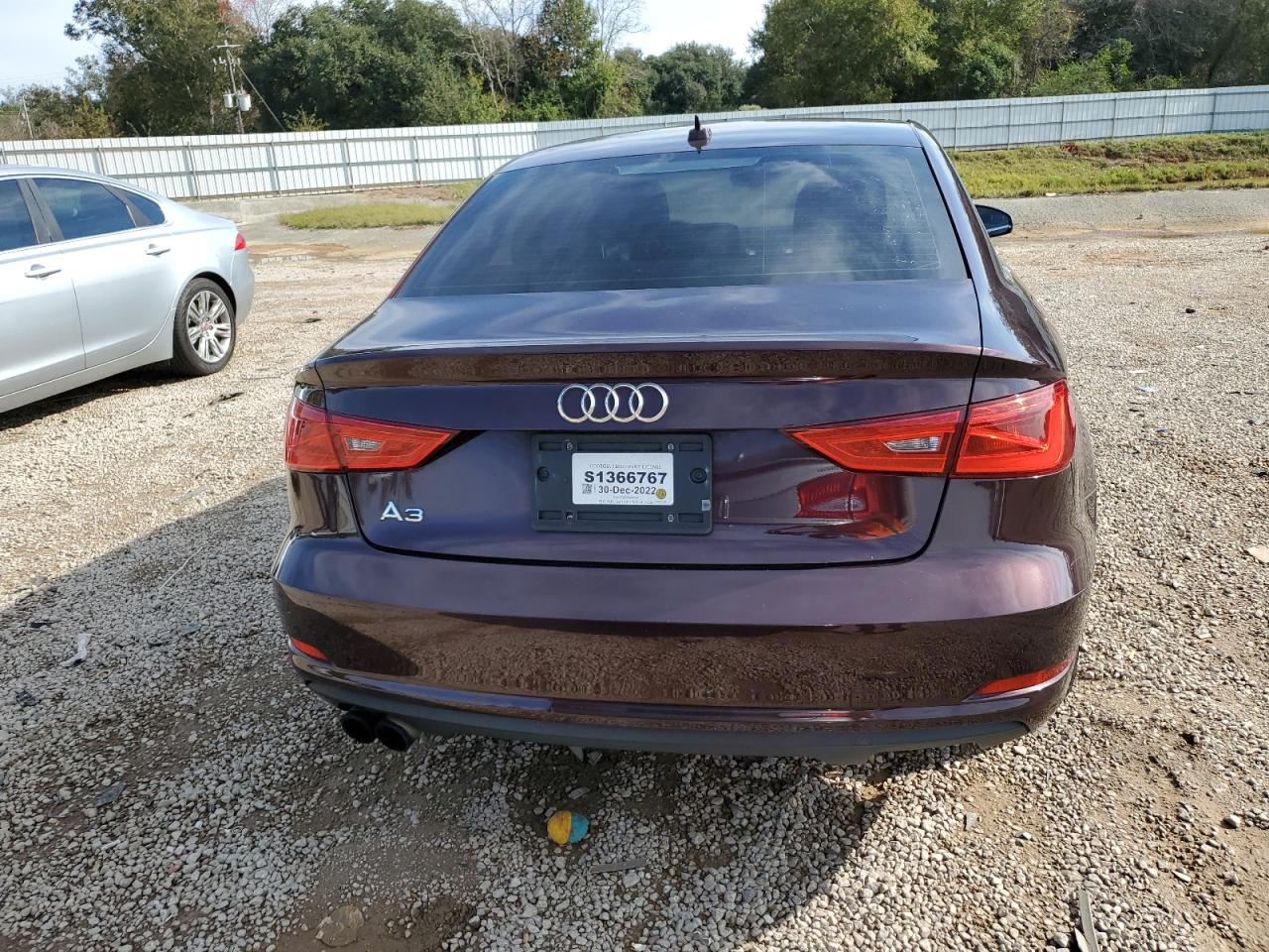 2015 Audi A3 Premium Plus Maroon vin: WAUCCGFF0F1065276 Damage: Rear Bumper, Heavy Scratch, 1/2 To 1 Inch