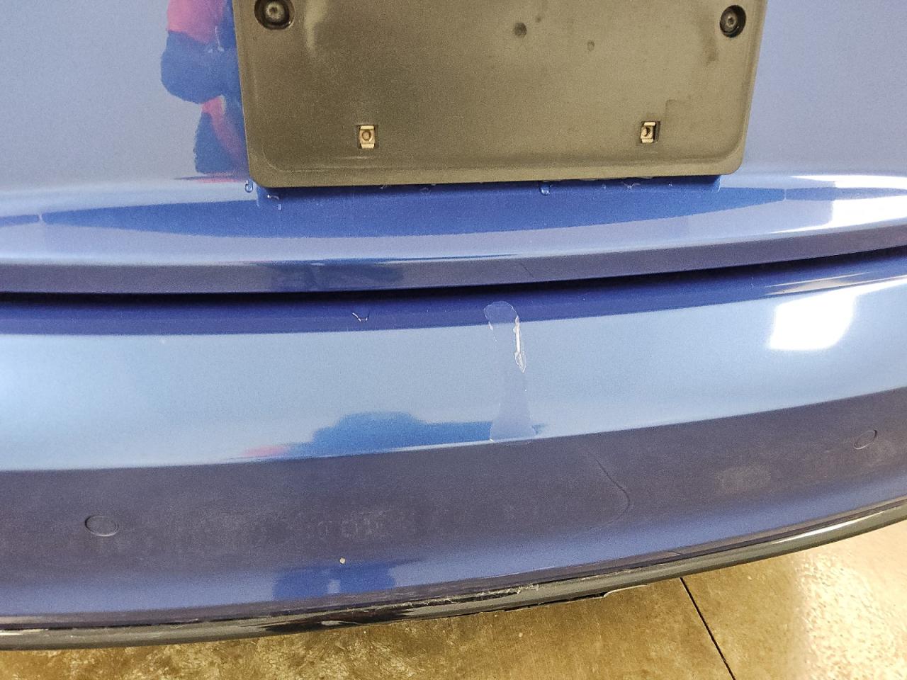 2015 Audi S5 Premium Plus Blue vin: WAUCGAFR8FA029461 Damage: Rear Bumper, Peeling, 2 To 3 Inches