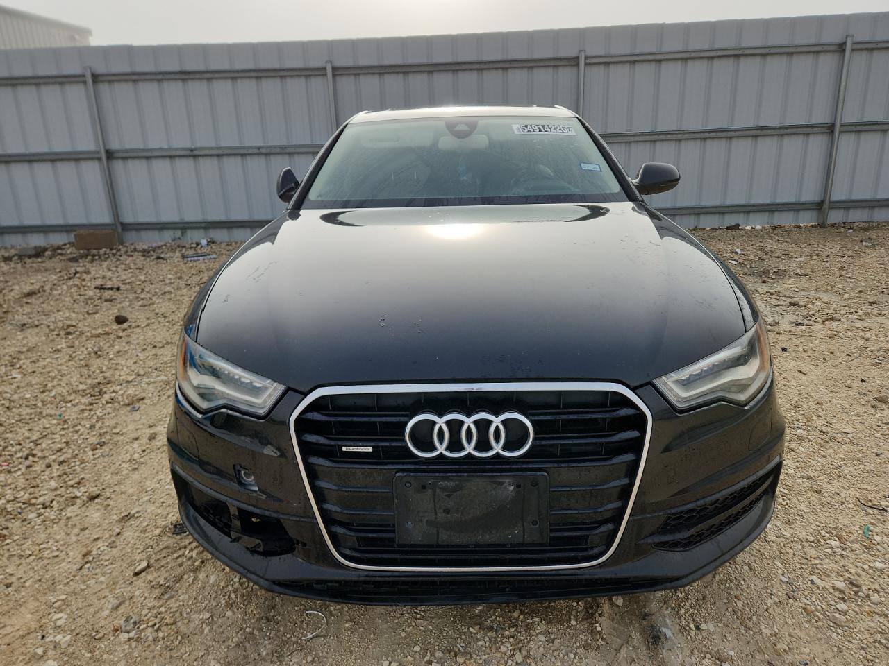 2015 Audi A6 Prestige Black vin: WAUHGAFC0FN025737 Damage: Front Bumper Tow Hook Cover, Missing, Replacement Required