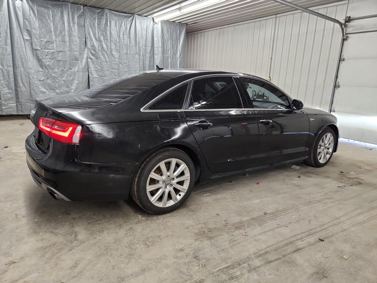 2015 Audi A6 Prestige Black vin: WAUHGAFC3FN020404 Damage: Right Tail Light, Broken, Replacement Required