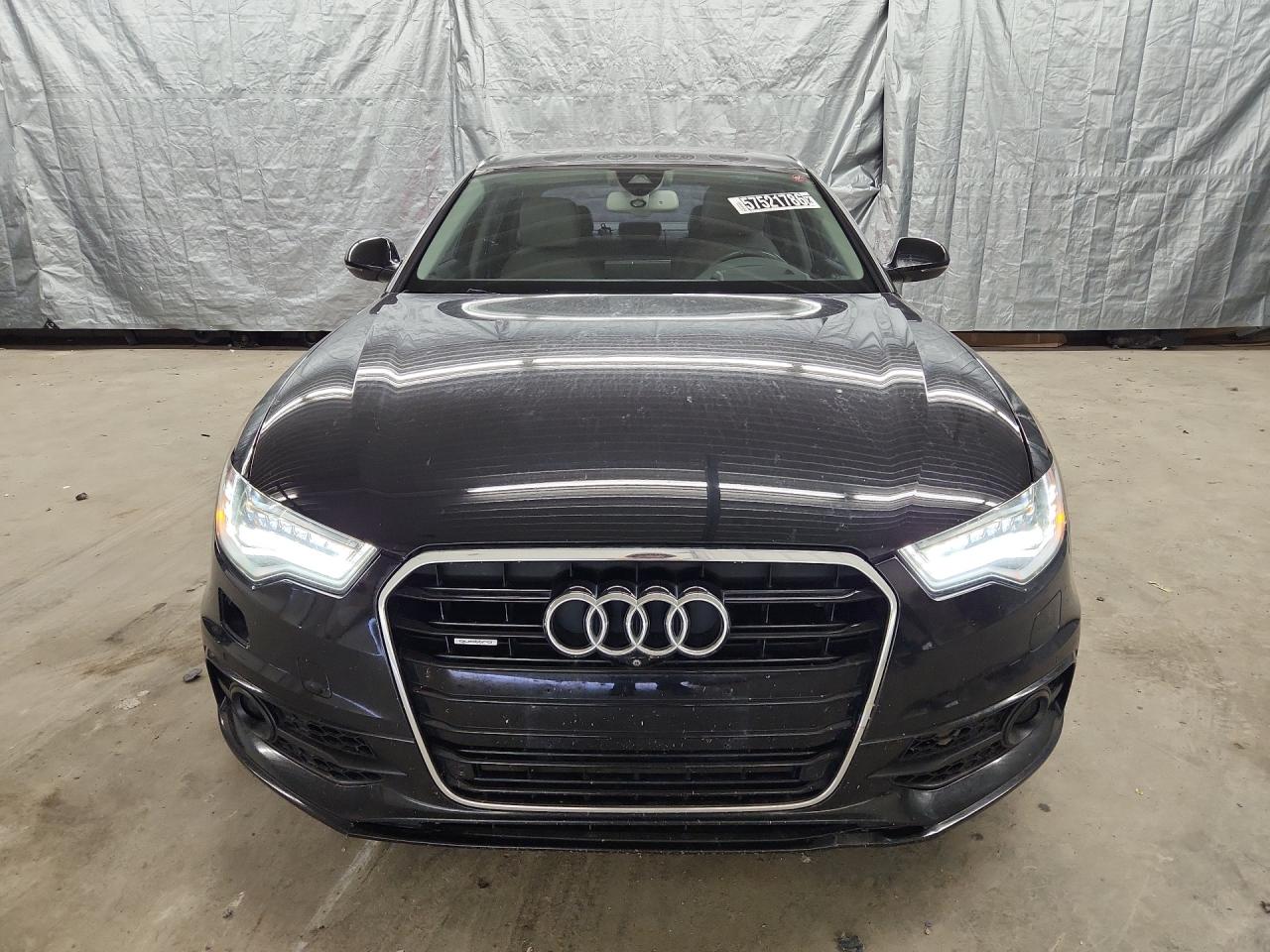 2015 Audi A6 Prestige Black vin: WAUHGAFC3FN020404 Damage: Front Bumper, Chipped, 3