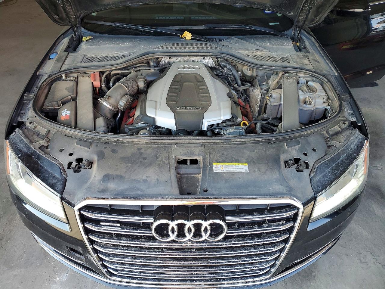 2015 Audi A8 Quattro Черный vin: WAUJGAFD6FN008788