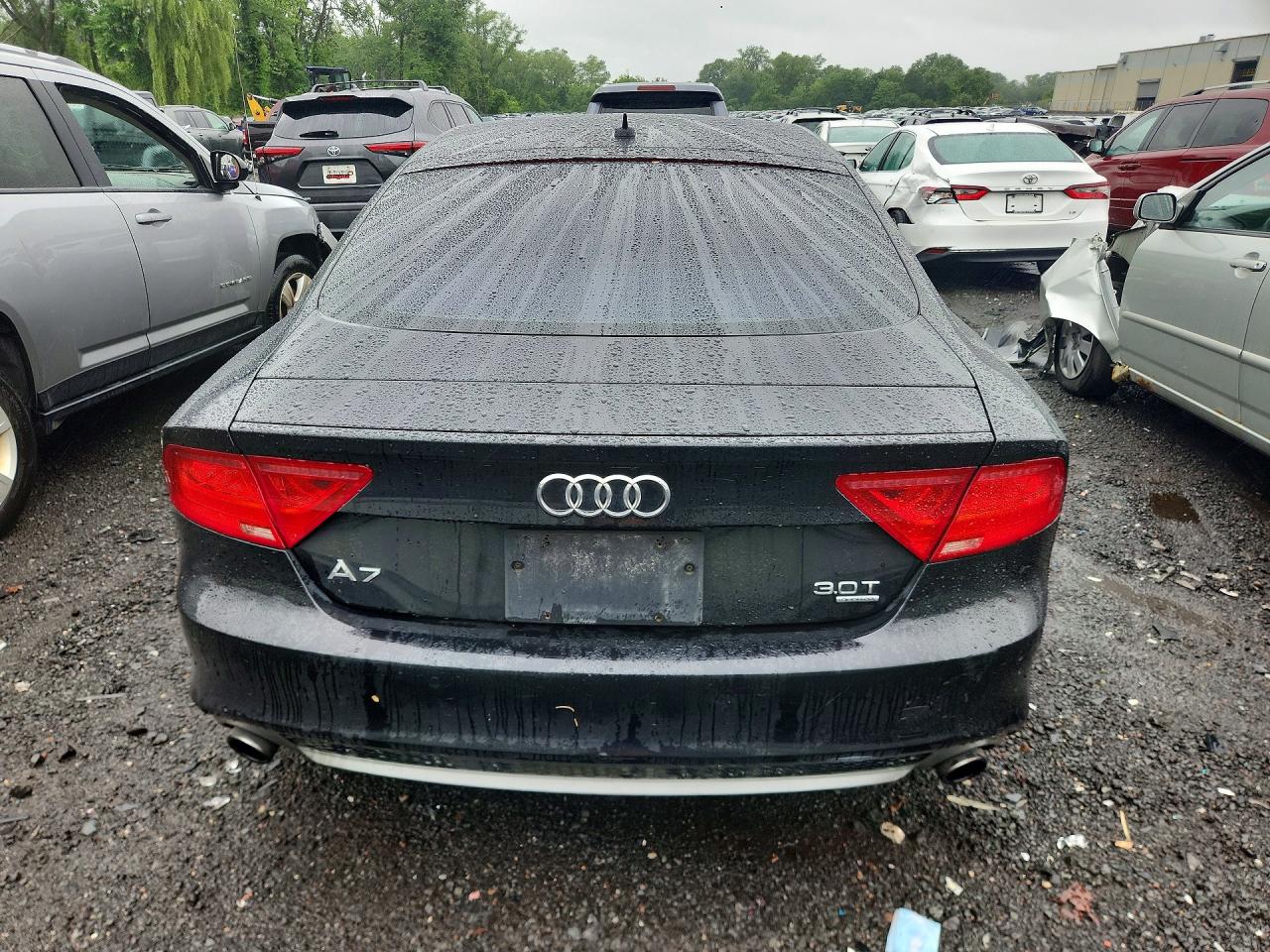 2012 Audi A7 Prestige Black vin: WAUSGAFC0CN008969