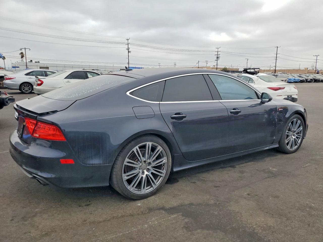 2012 Audi A7 Prestige Blue vin: WAUSGAFC8CN031111