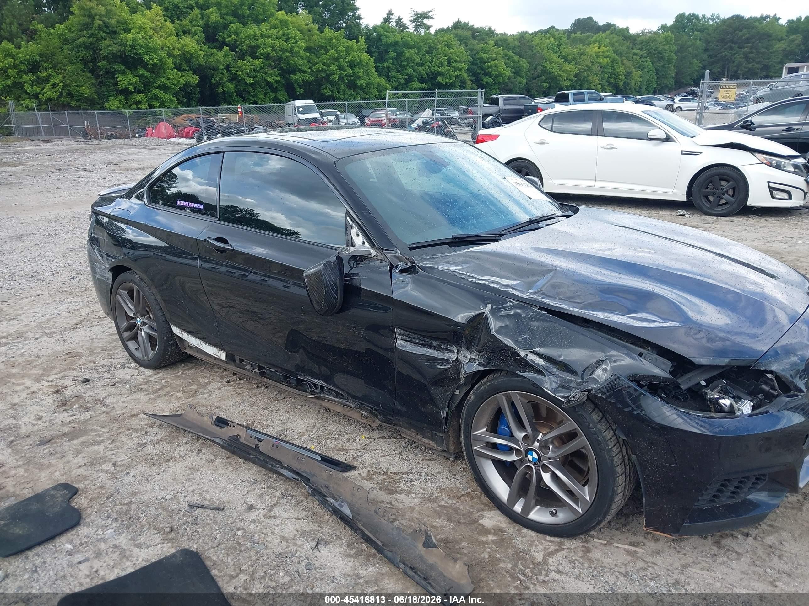 2015 Bmw 228i   Черный vin: WBA1F5C58FV257312