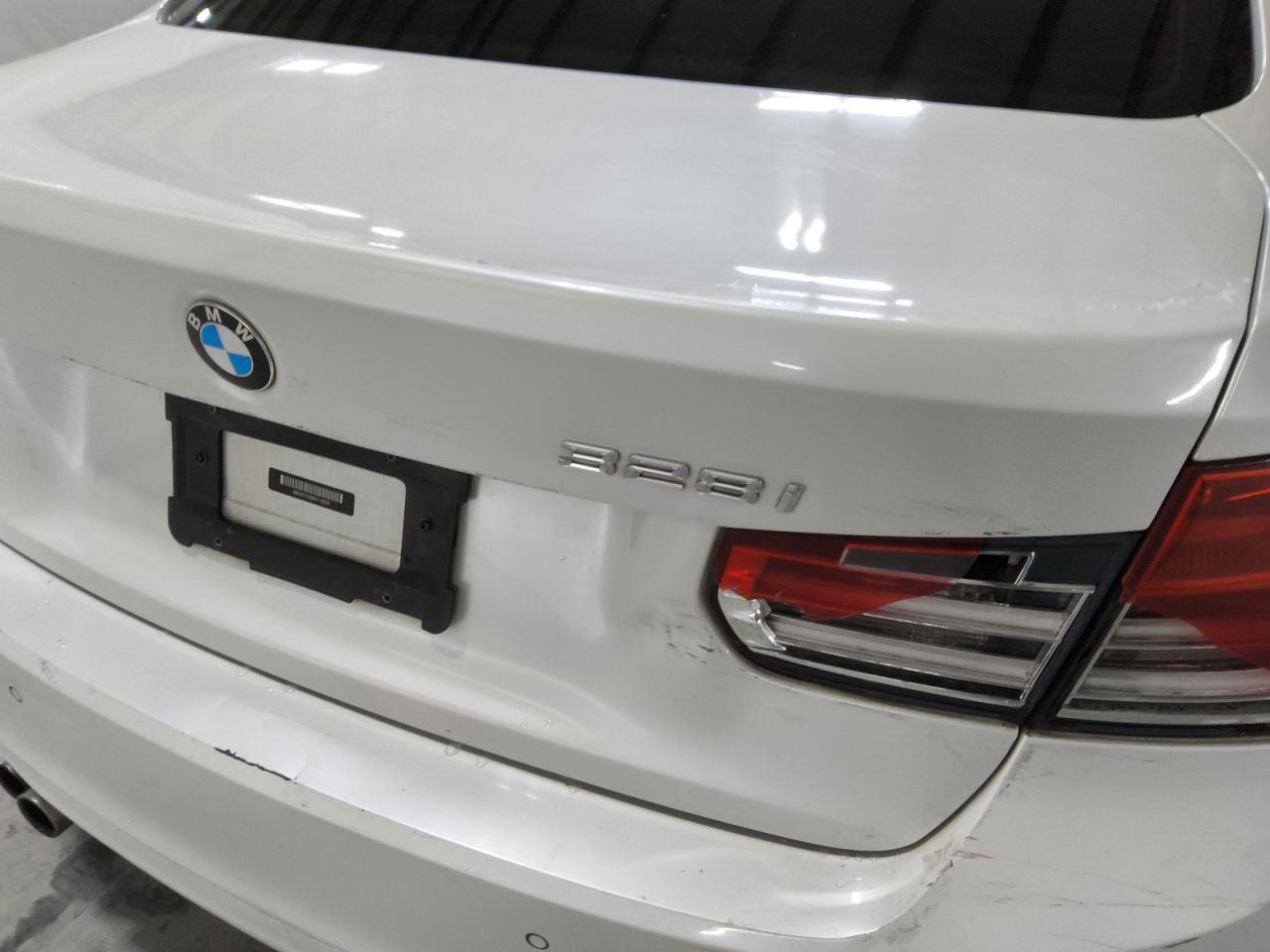 2015 Bmw 328 I Sulev White vin: WBA3C1C56FK119229 Damage: Deck Lid, Dent(S) W/ Paint Dmg, 3 To 4 Inches